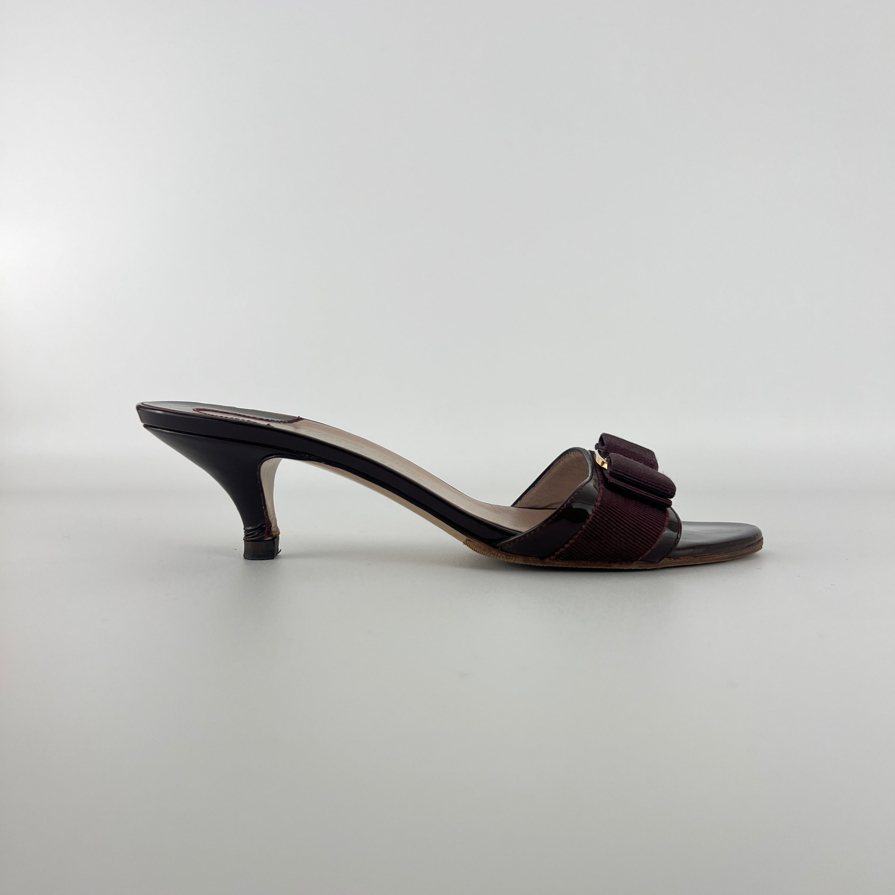 Ferragamo | Vara Bow Brown Eggplant Patent Leather Gold Sandal Mules (6.5, 36.5)