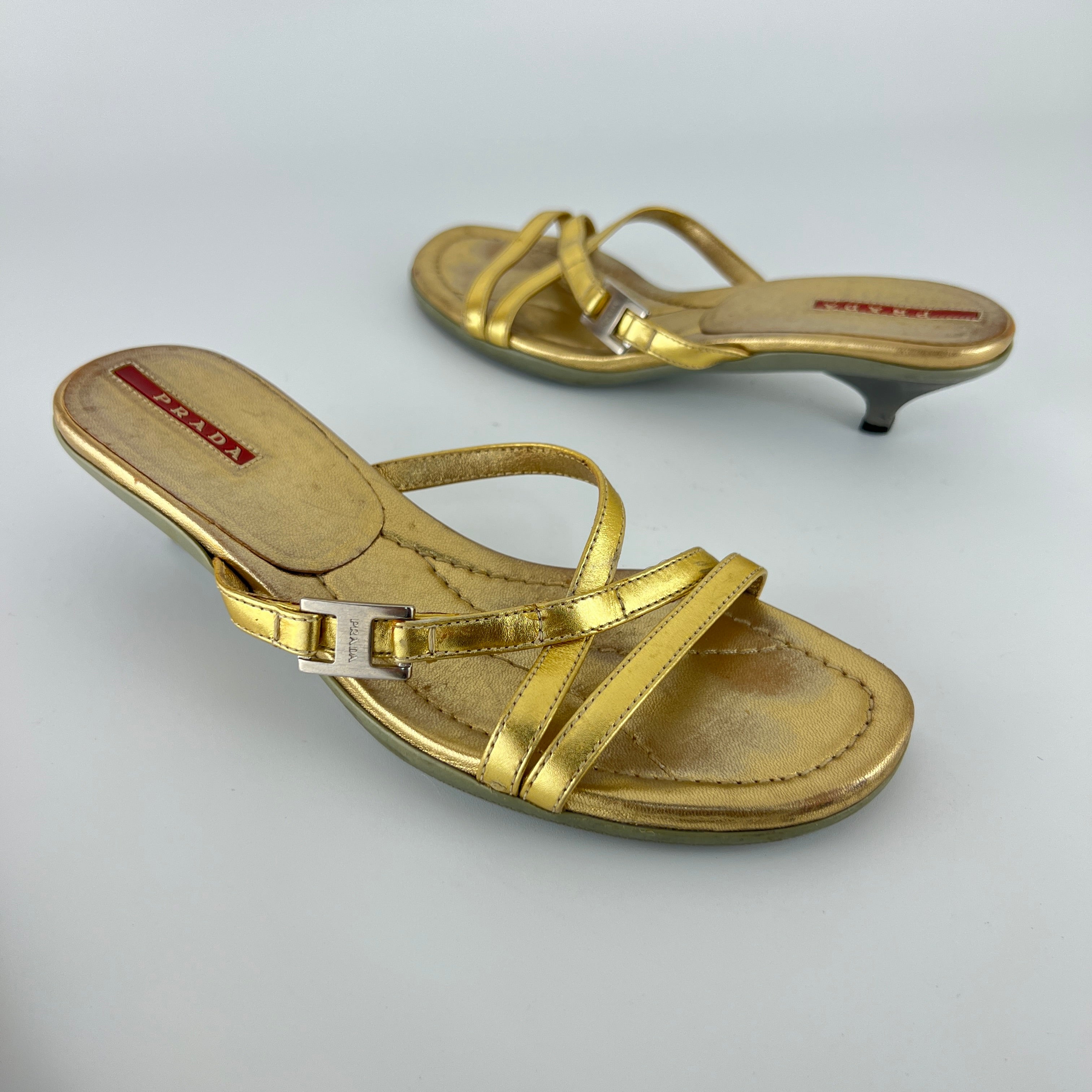 Prada | Vintage Gold Leather Logo Buckle Strappy Kitten Heel Slide Mules (36.5)