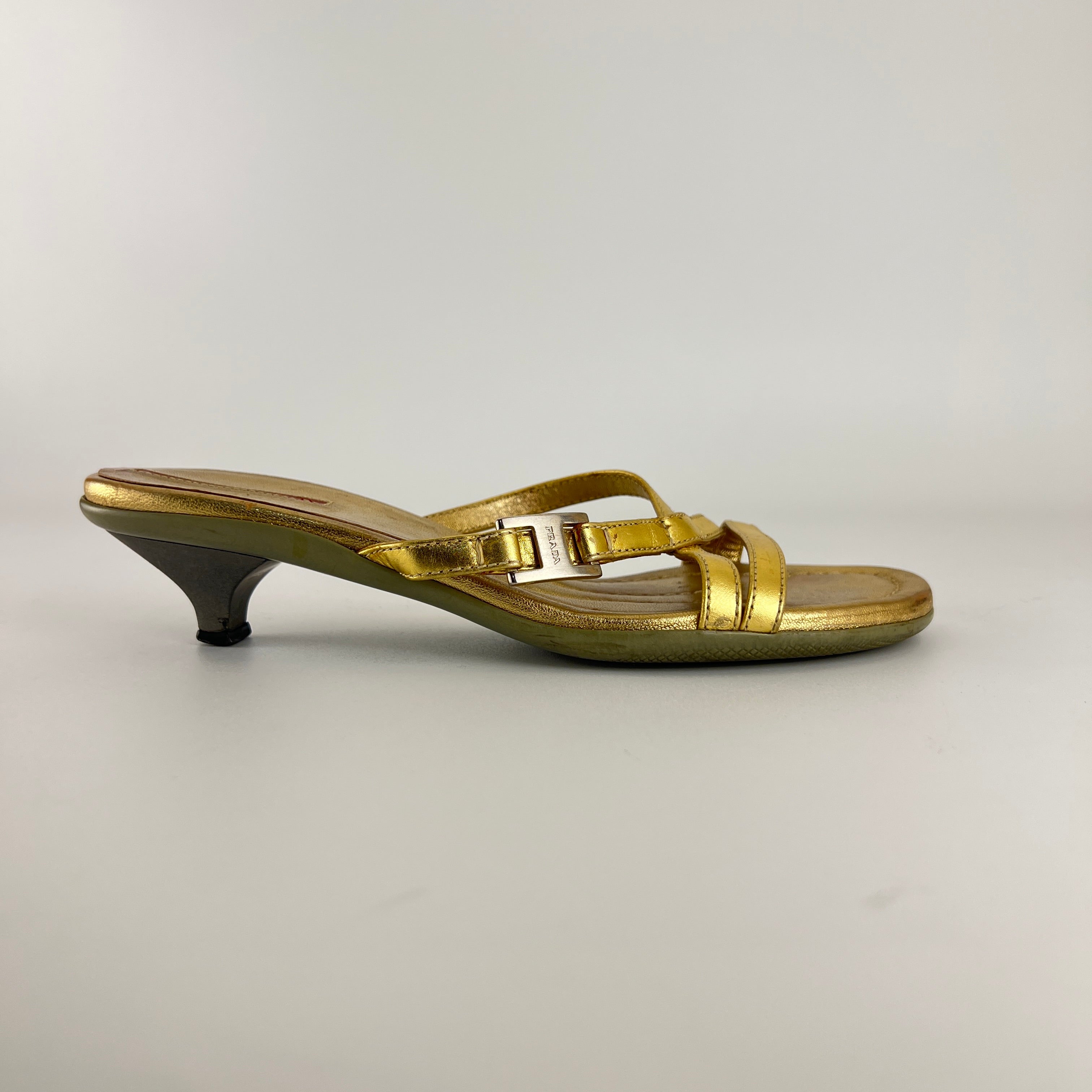 Prada | Vintage Gold Leather Logo Buckle Strappy Kitten Heel Slide Mules (36.5)
