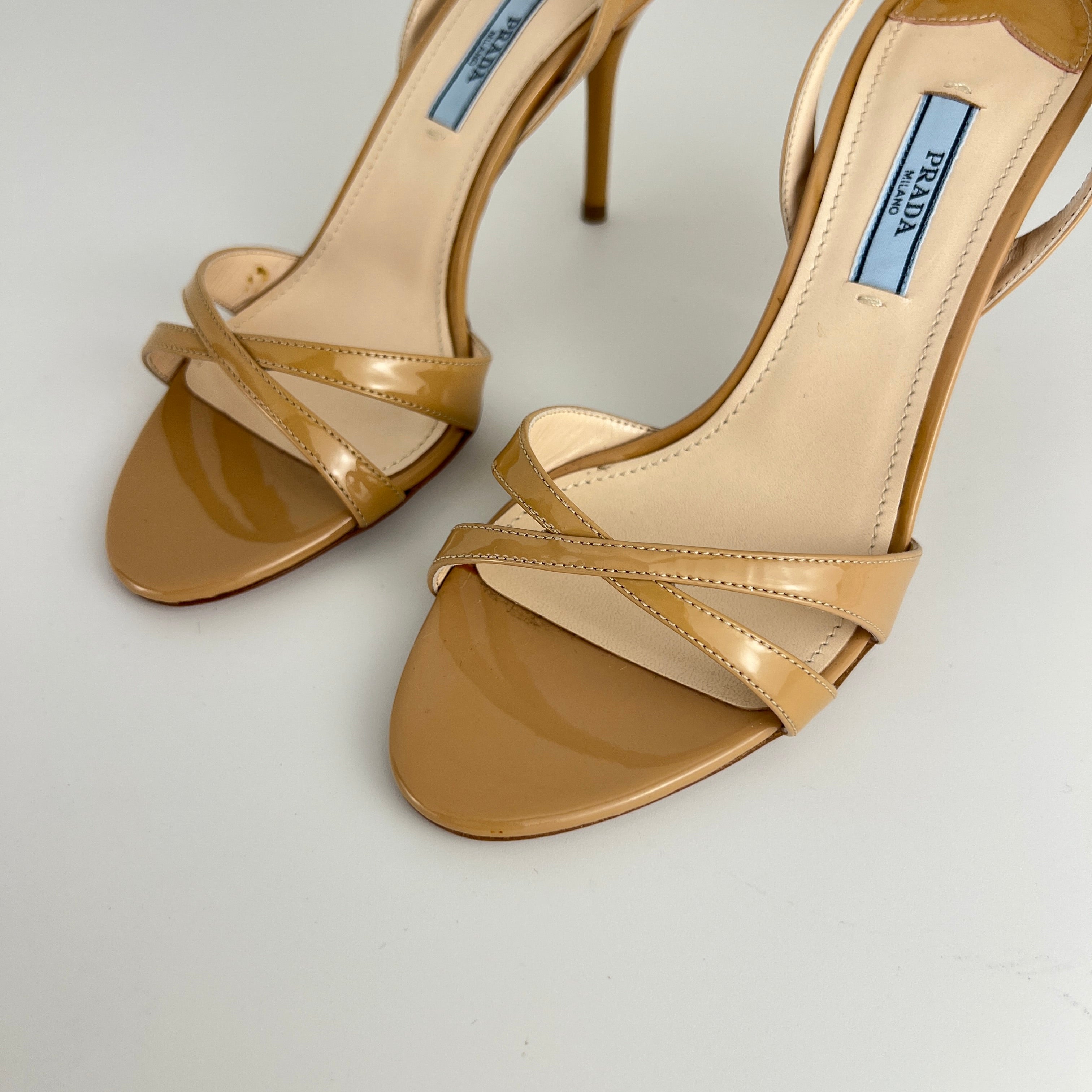 Prada | Nude Patent Leather Criss Cross Slingback Stiletto Heels (36.5)