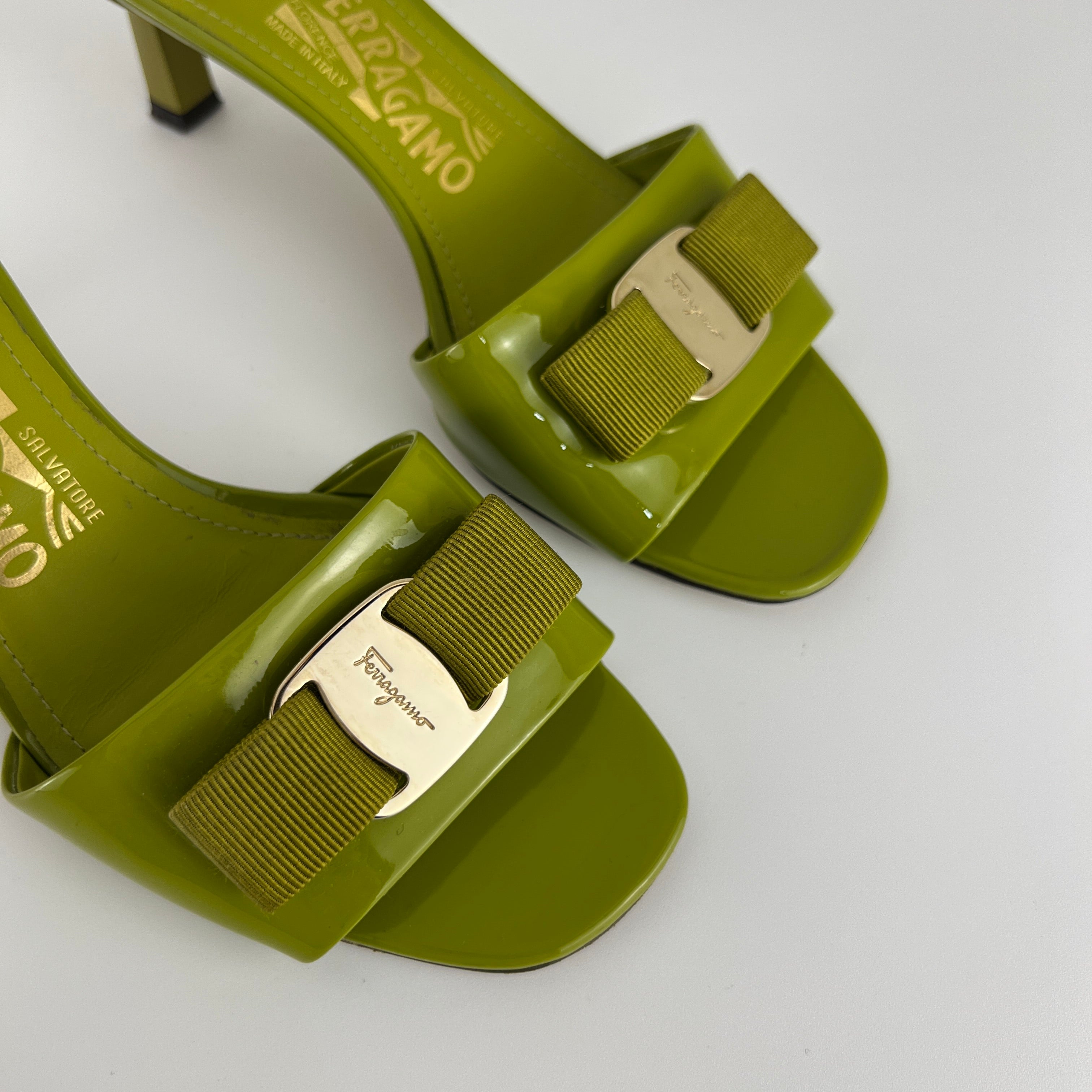 Ferragamo | Glo 55 Vara Bow Olive Green Patent Leather Slide Mules (6, 36)