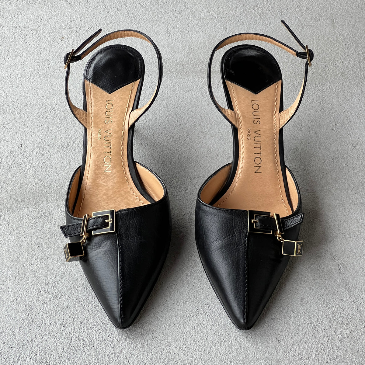 Louis Vuitton | Black Leather Logo Cube Buckle Pointed Toe Slingback Heels (39)