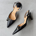 Louis Vuitton | Black Leather Logo Cube Buckle Pointed Toe Slingback Heels (39)
