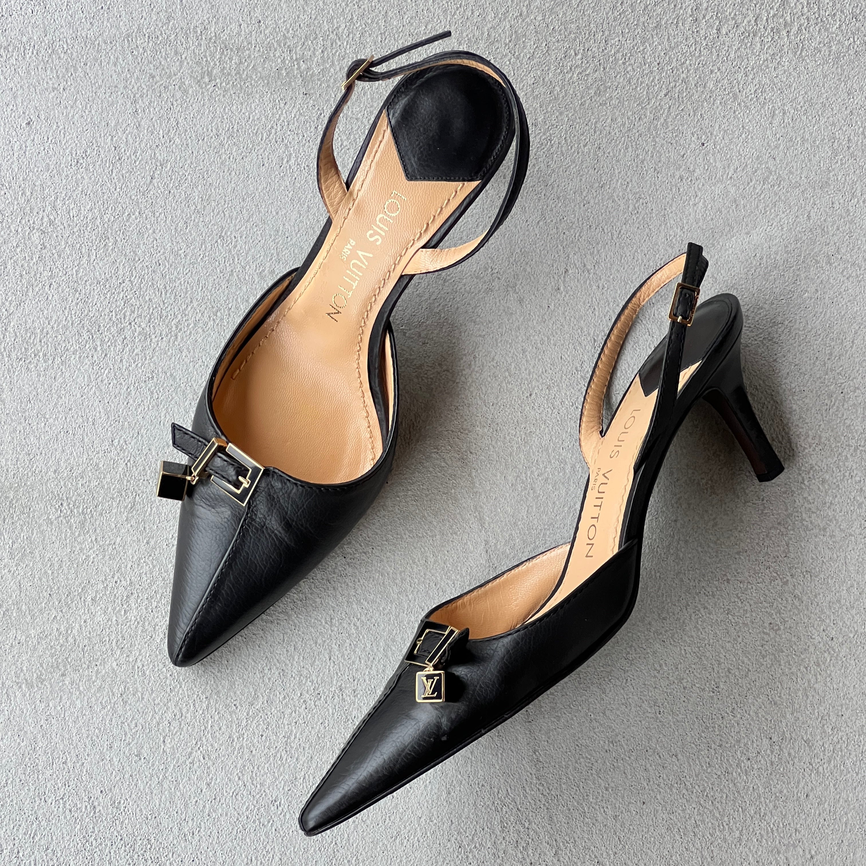 Louis Vuitton | Black Leather Logo Cube Buckle Pointed Toe Slingback Heels (39)