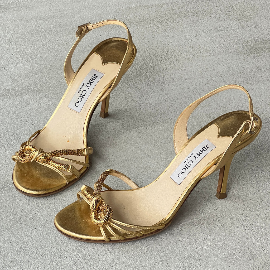 Jimmy Choo | Metallic Gold Leather Metal Knot Slingback Stiletto Heels (37.5)