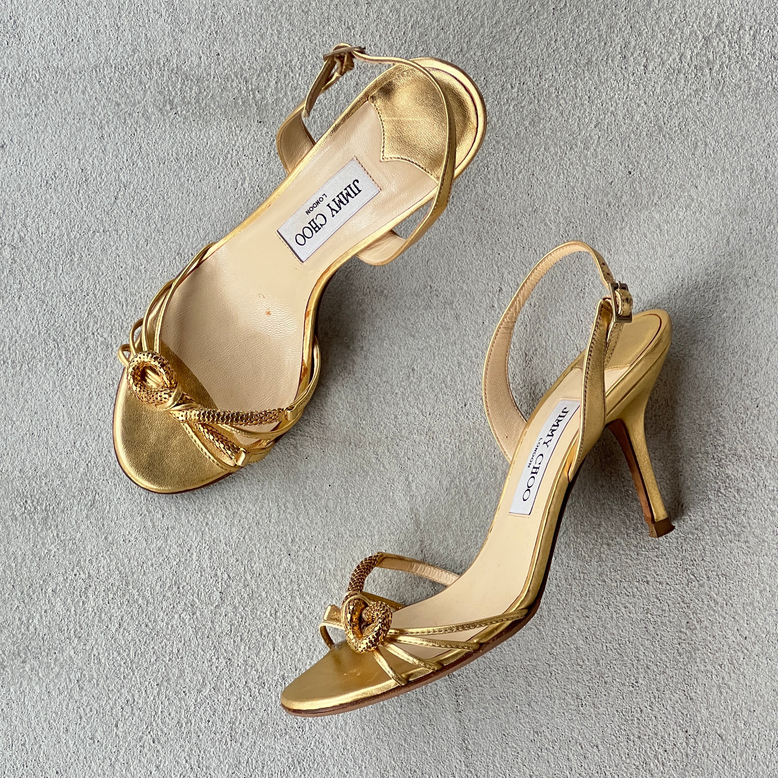 Jimmy Choo | Metallic Gold Leather Metal Knot Slingback Stiletto Heels (37.5)