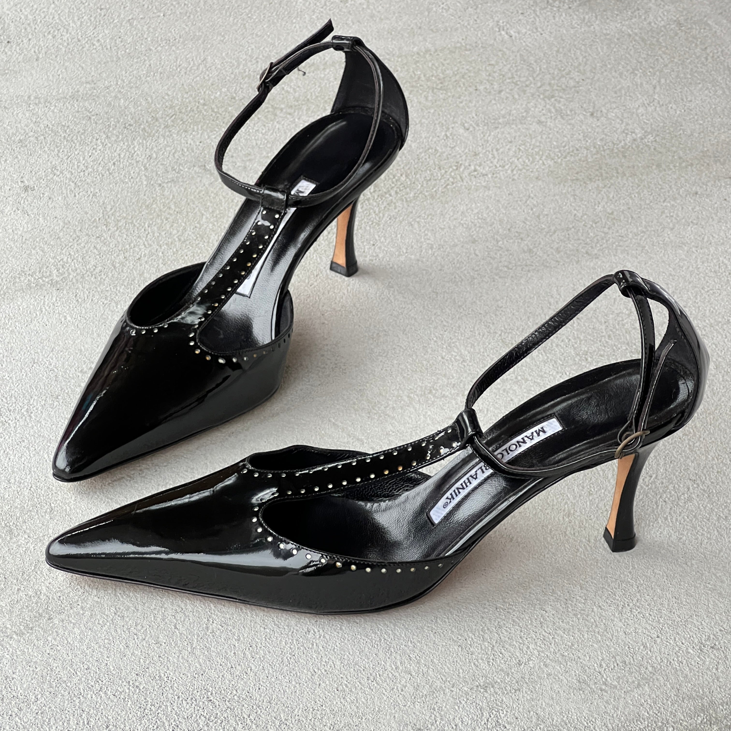 Manolo Blahnik | Black Patent Leather T-Strap Pointed Toe Pump (39)