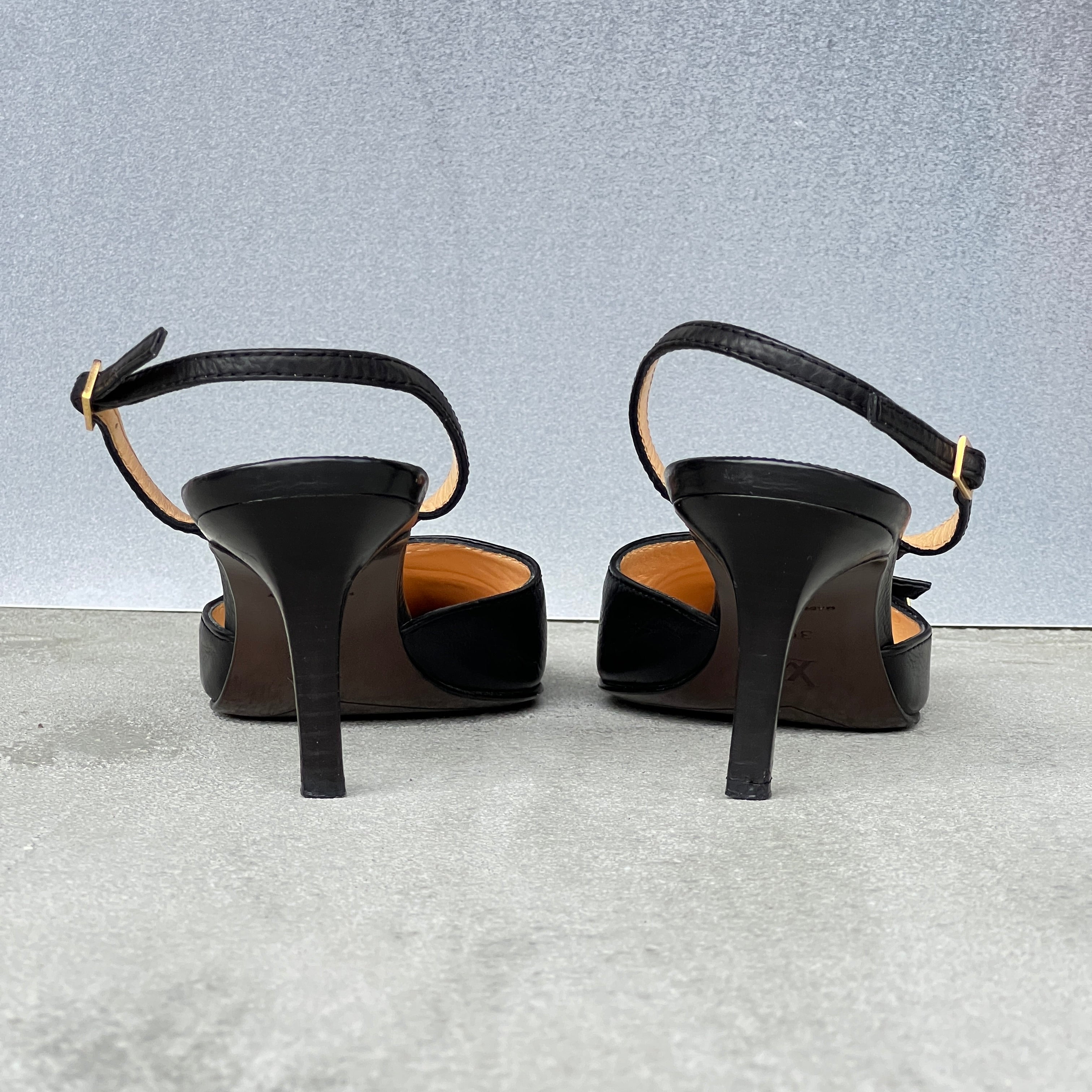 Louis Vuitton | Black Leather Logo Cube Buckle Pointed Toe Slingback Heels (39)