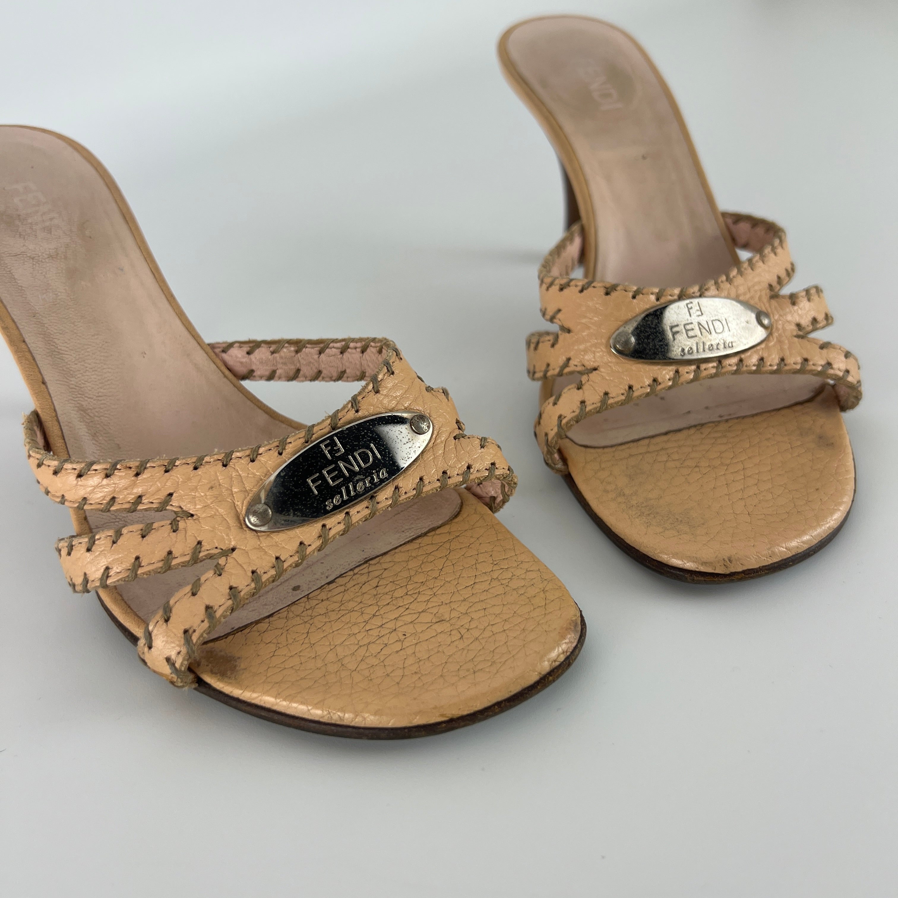 Fendi | Vintage Selleria Nude Tan Leather Silver Metal Logo Slide Mules (36.5)