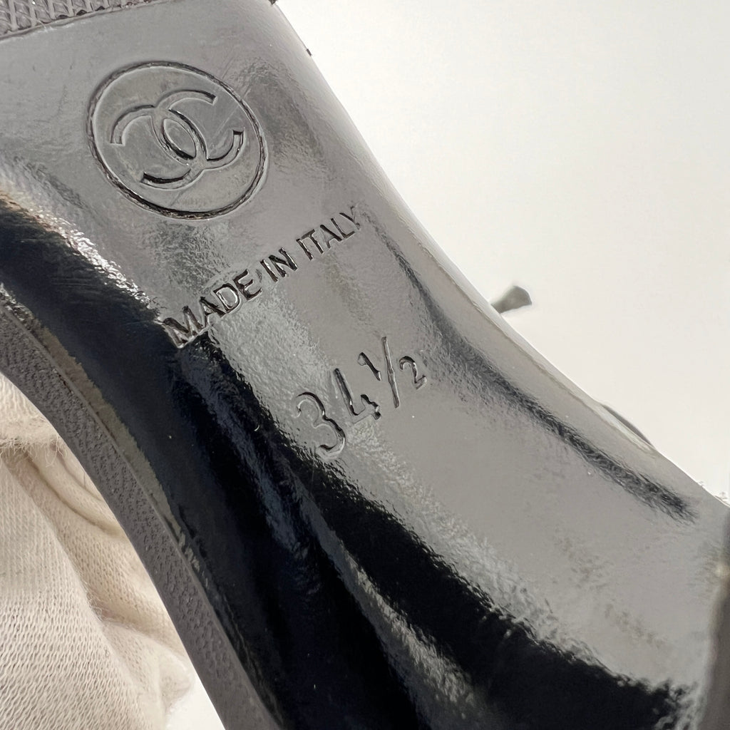 Chanel | Vintage Black Leather CC Logo Ribbon Bow Mules (34.5)