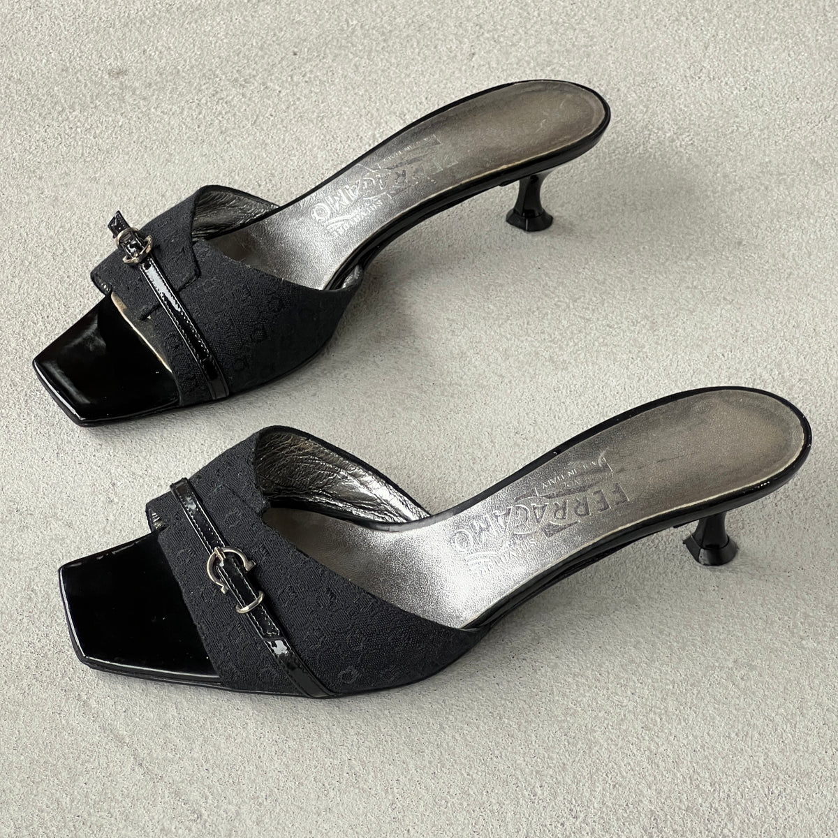 Ferragamo | Black Monogram Leather Buckle Slide Mules (5.5 , 35.5)