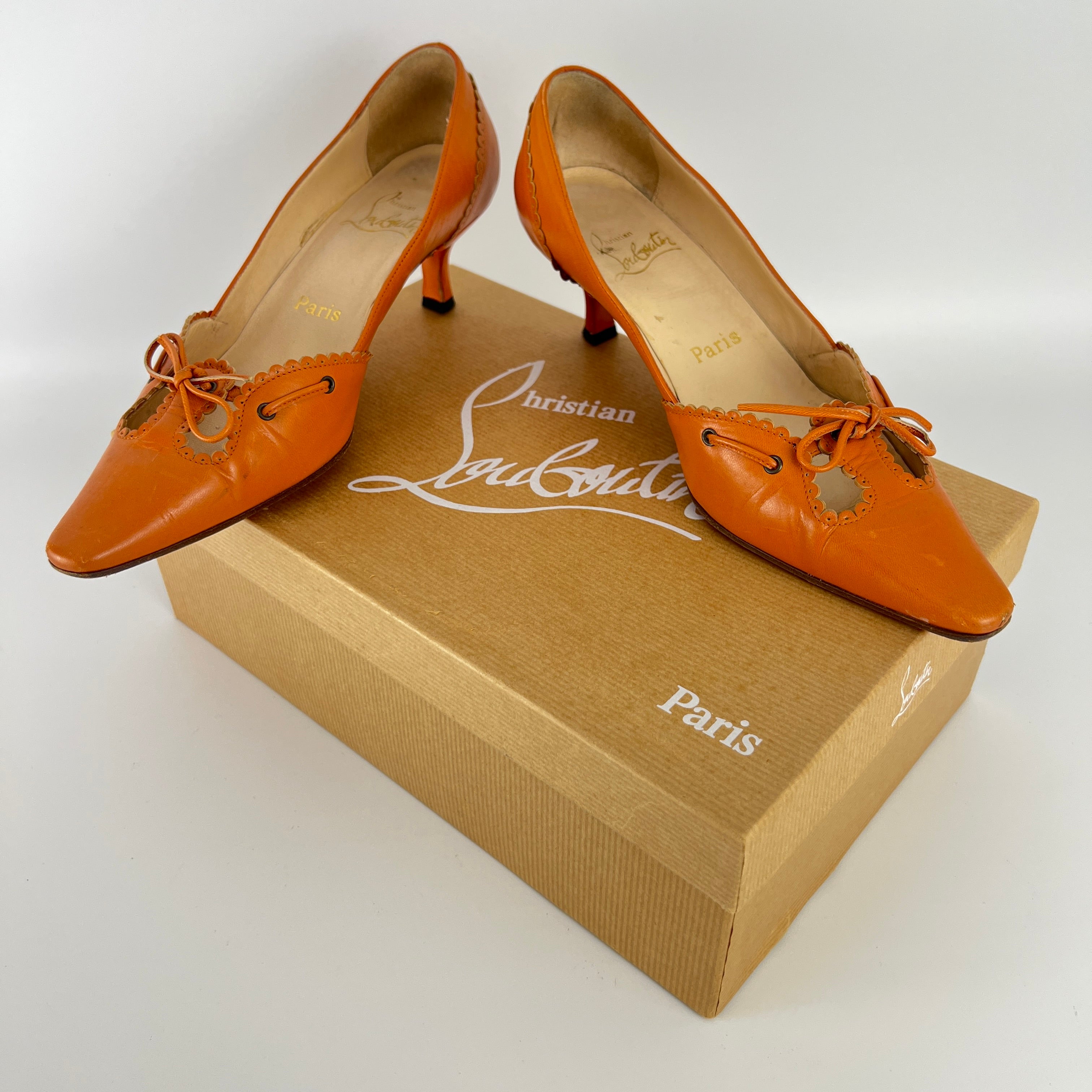 Louboutin | Orange Leather Ribbon Cut-Out Pointed Toe Kitten Heel Pumps (36)