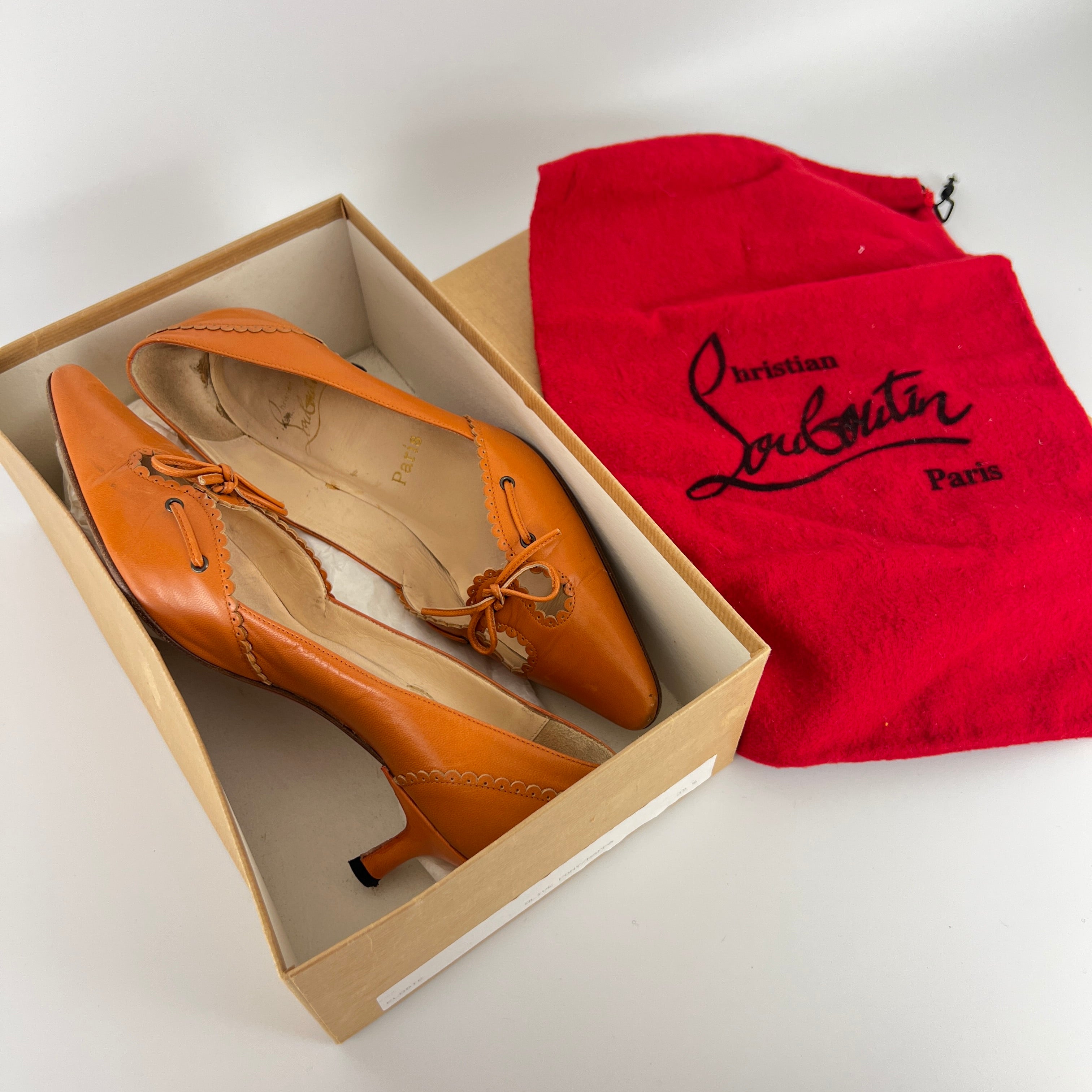 Louboutin | Orange Leather Ribbon Cut-Out Pointed Toe Kitten Heel Pumps (36)