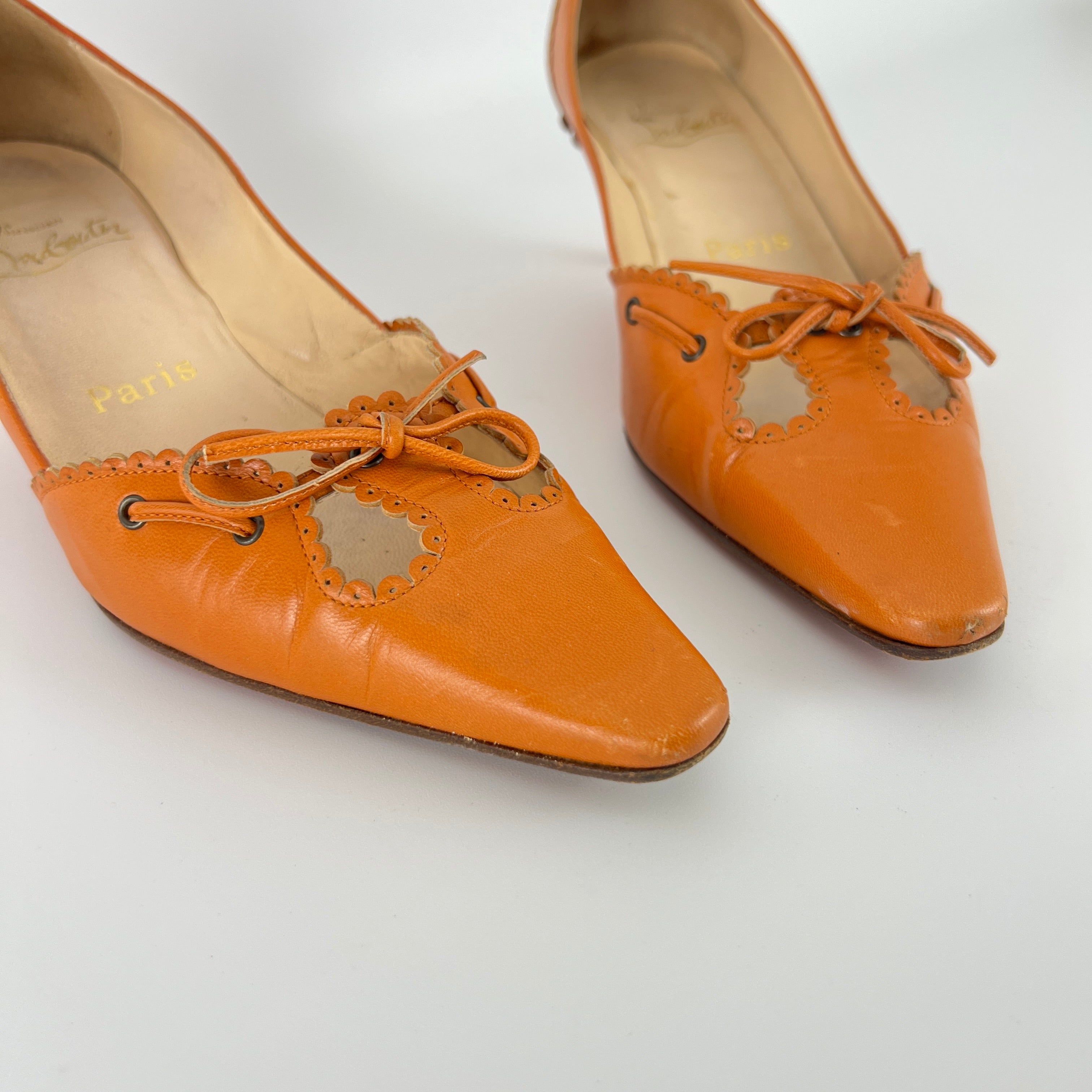 Louboutin | Orange Leather Ribbon Cut-Out Pointed Toe Kitten Heel Pumps (36)