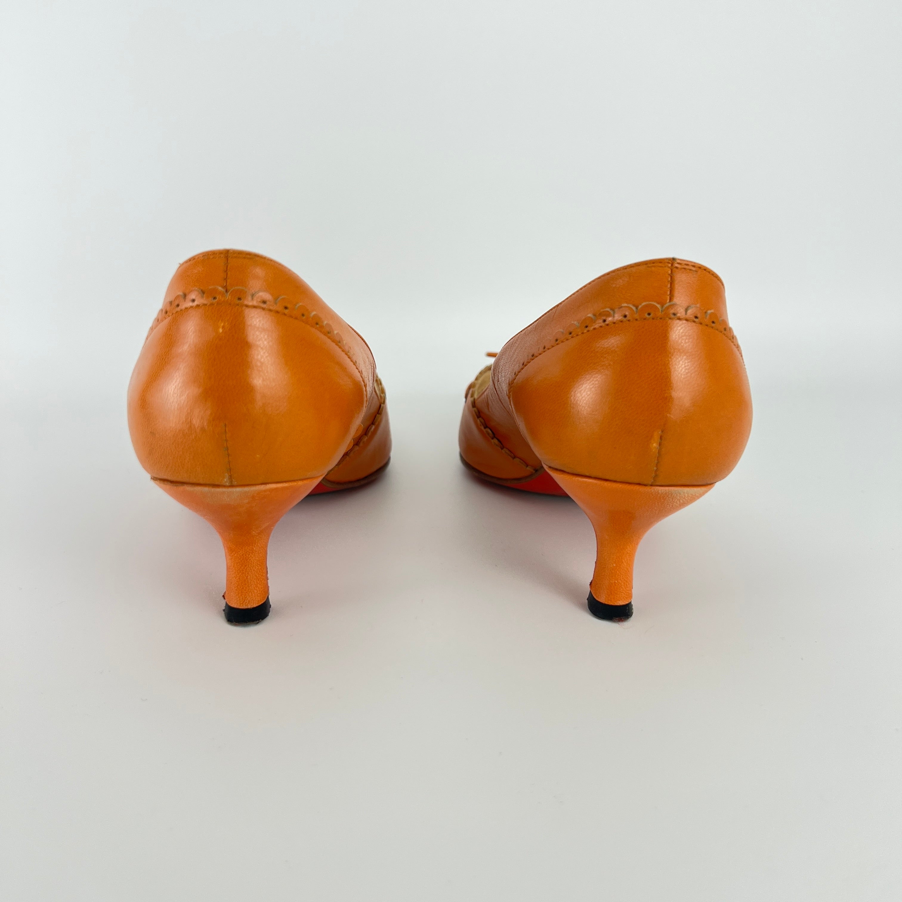 Louboutin | Orange Leather Ribbon Cut-Out Pointed Toe Kitten Heel Pumps (36)