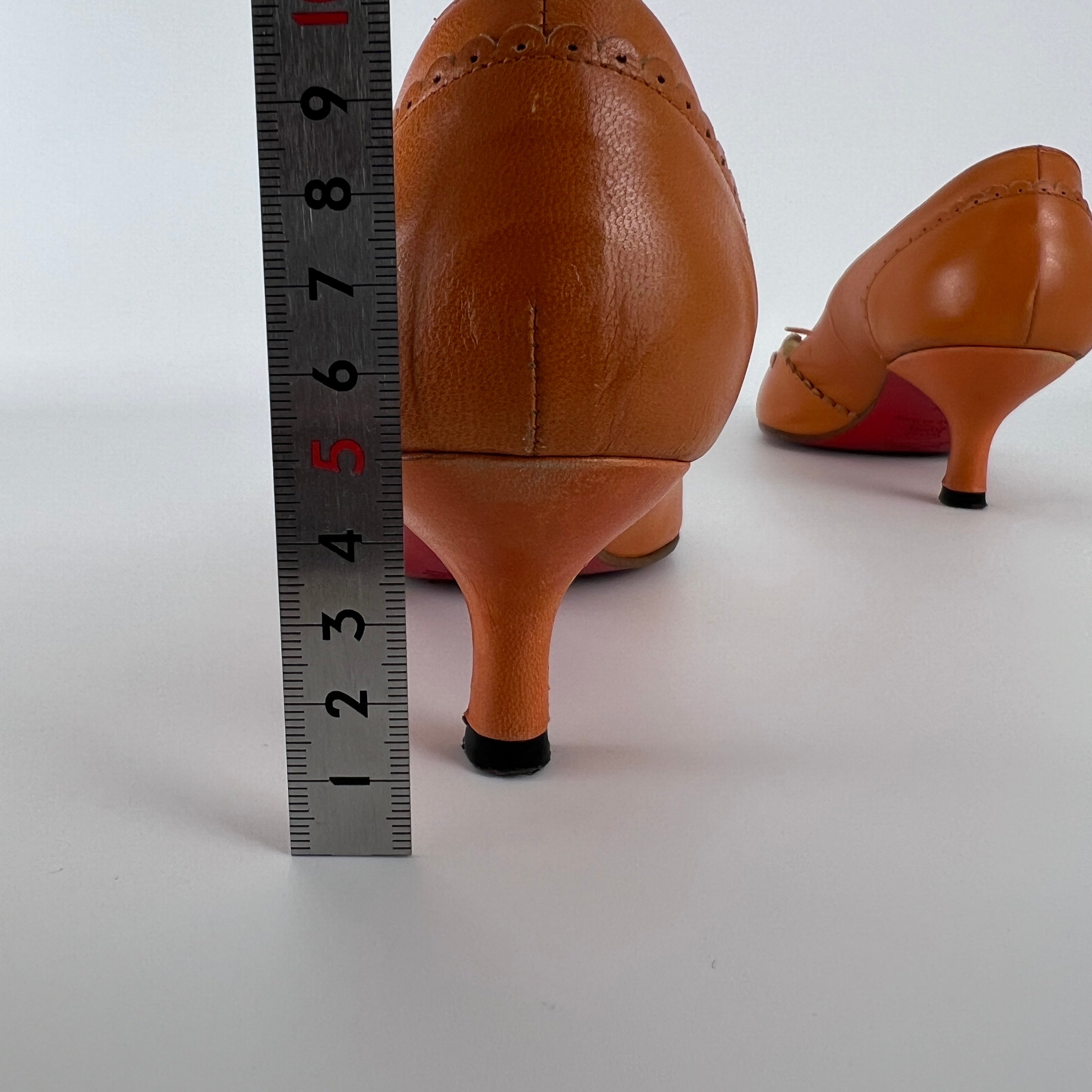Louboutin | Orange Leather Ribbon Cut-Out Pointed Toe Kitten Heel Pumps (36)