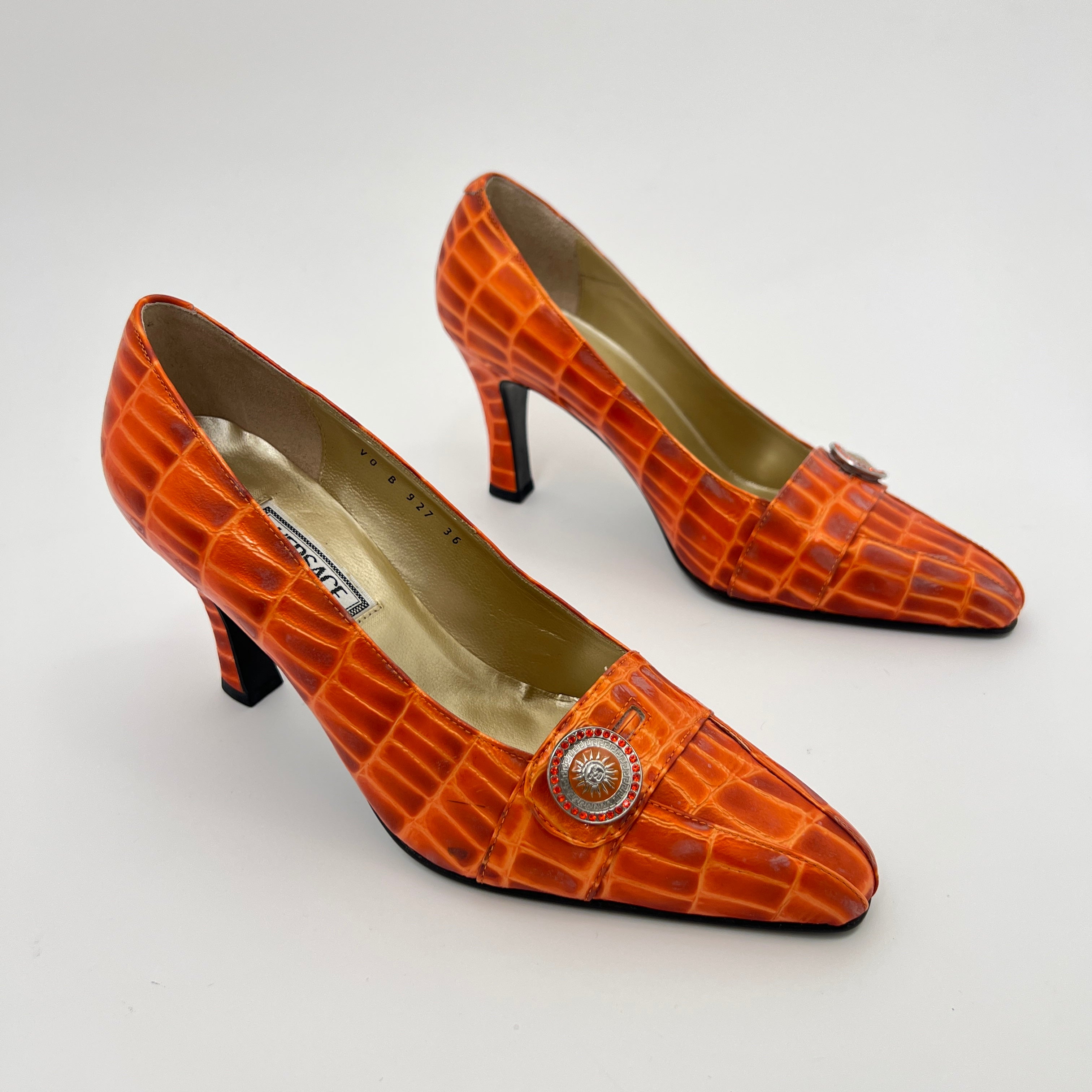 Versace | Vintage Orange Exotic Leather Sun Dial Rhinestone Pumps (36)