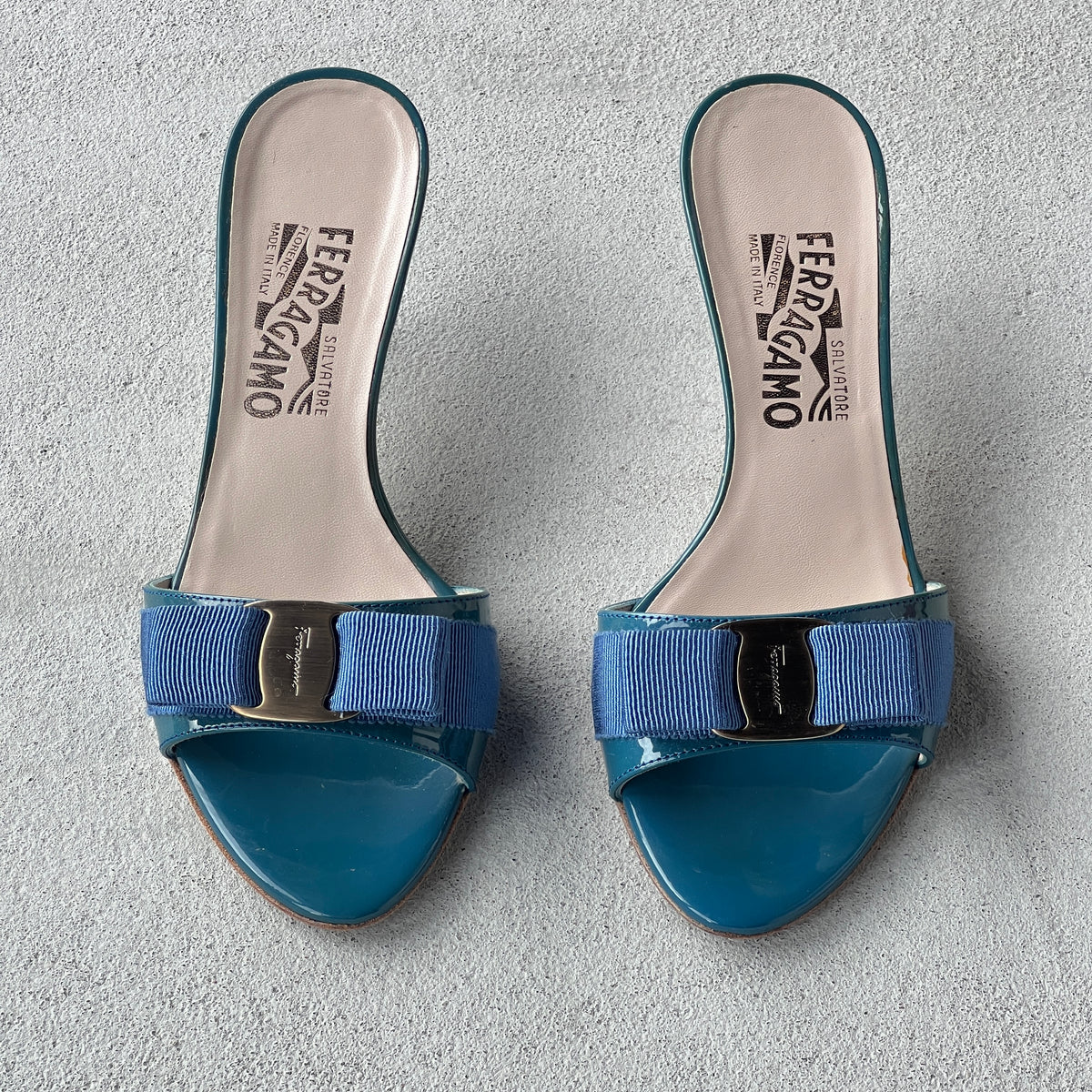 Ferragamo | Glory Vara Bow Blue Patent Leather Silver Logo Slide Mules (5.5 , 35.5)