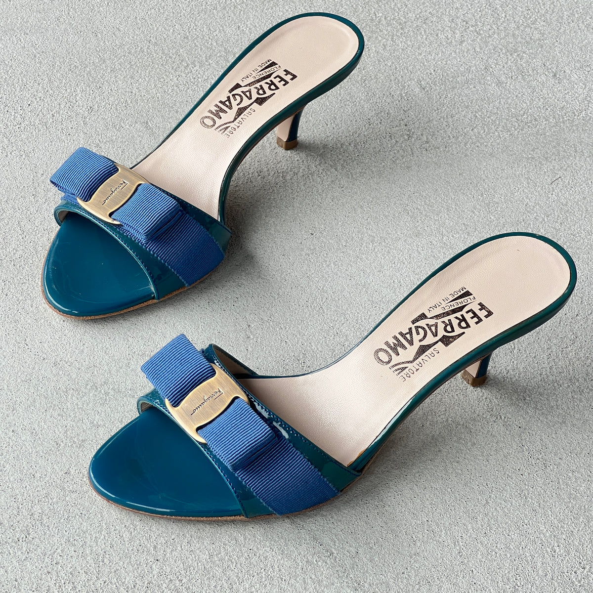 Ferragamo | Glory Vara Bow Blue Patent Leather Silver Logo Slide Mules (5.5 , 35.5)