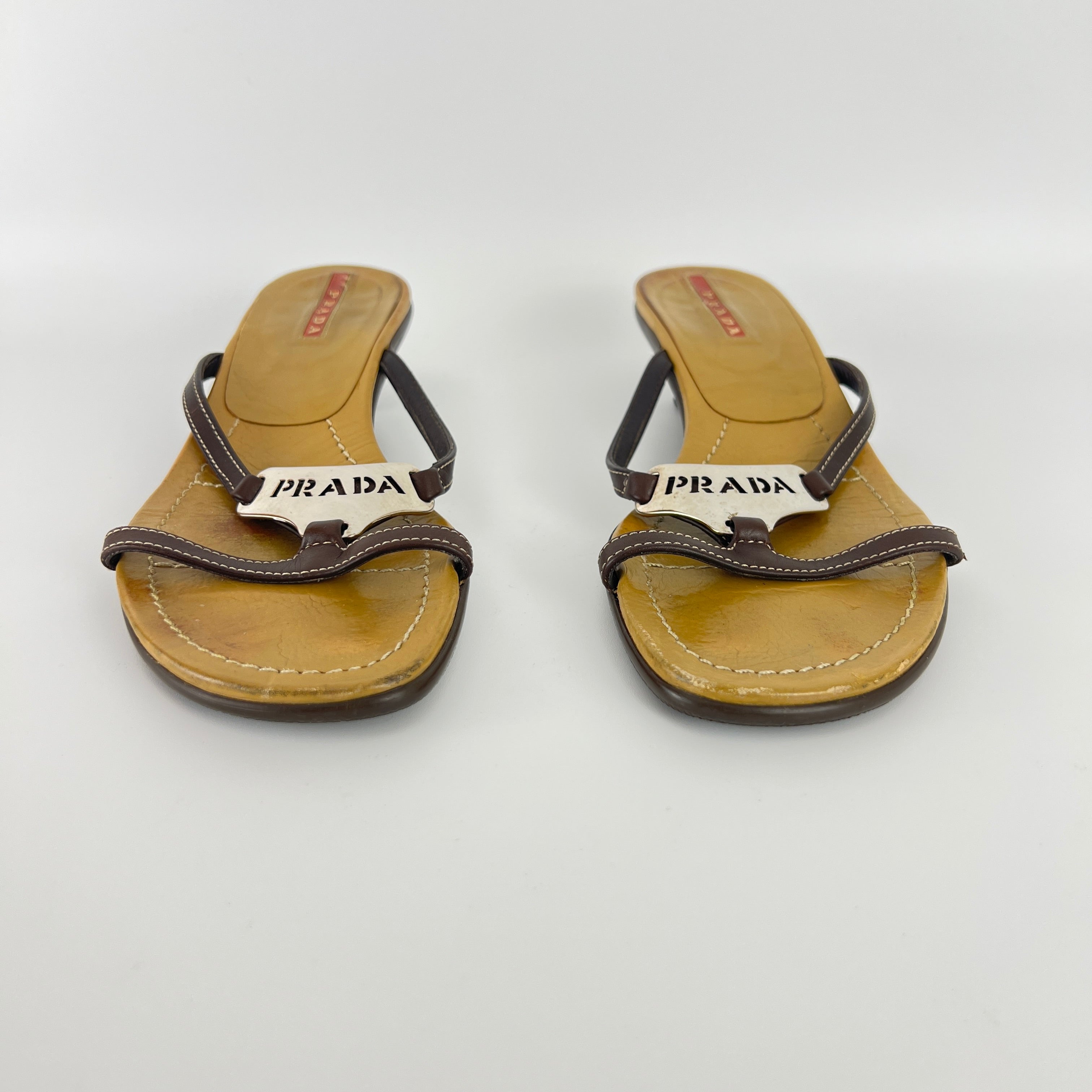 Prada | Brown Leather Silver Logo Buckle Kitten Sandal Heels (34.5)