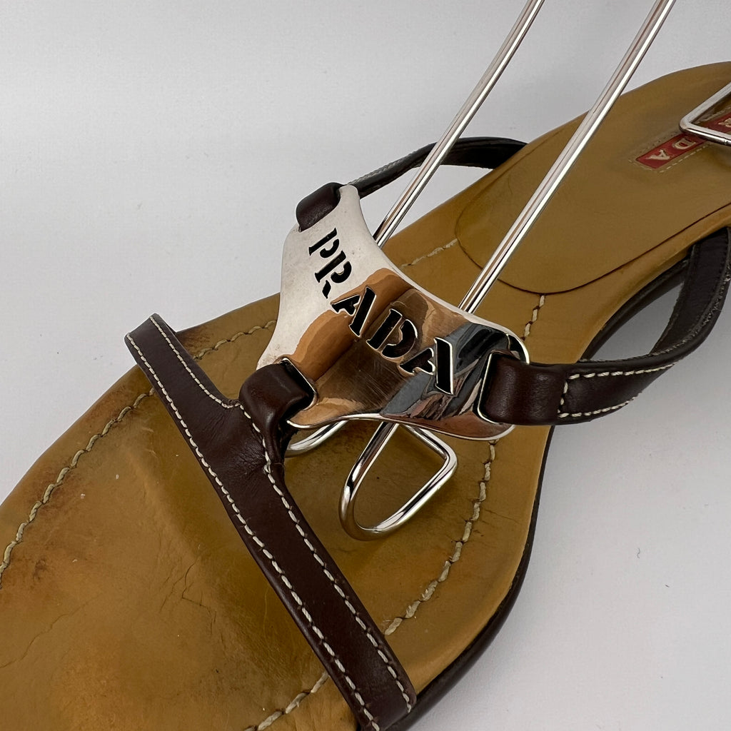 Prada | Brown Leather Silver Logo Buckle Kitten Sandal Heels (34.5)