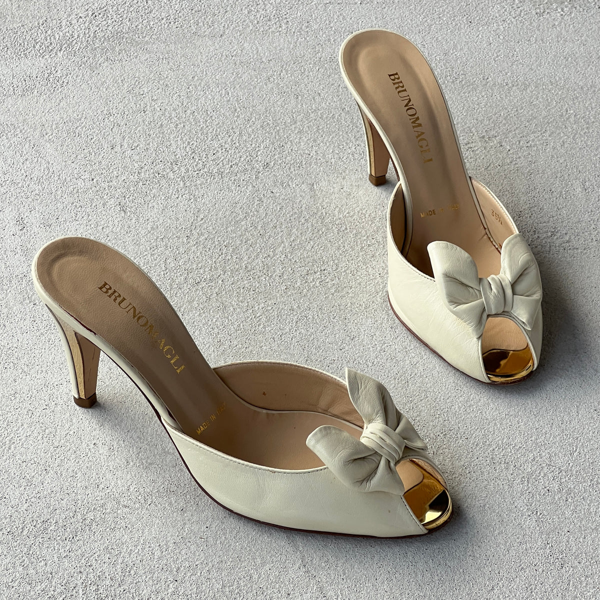 Bruno Magli | White Leather Bow Gold Metallic Heel Slide Mules (35.5)