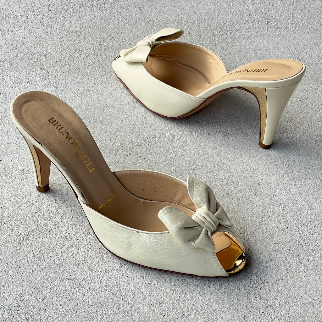 Bruno Magli | White Leather Bow Gold Metallic Heel Slide Mules (35.5)