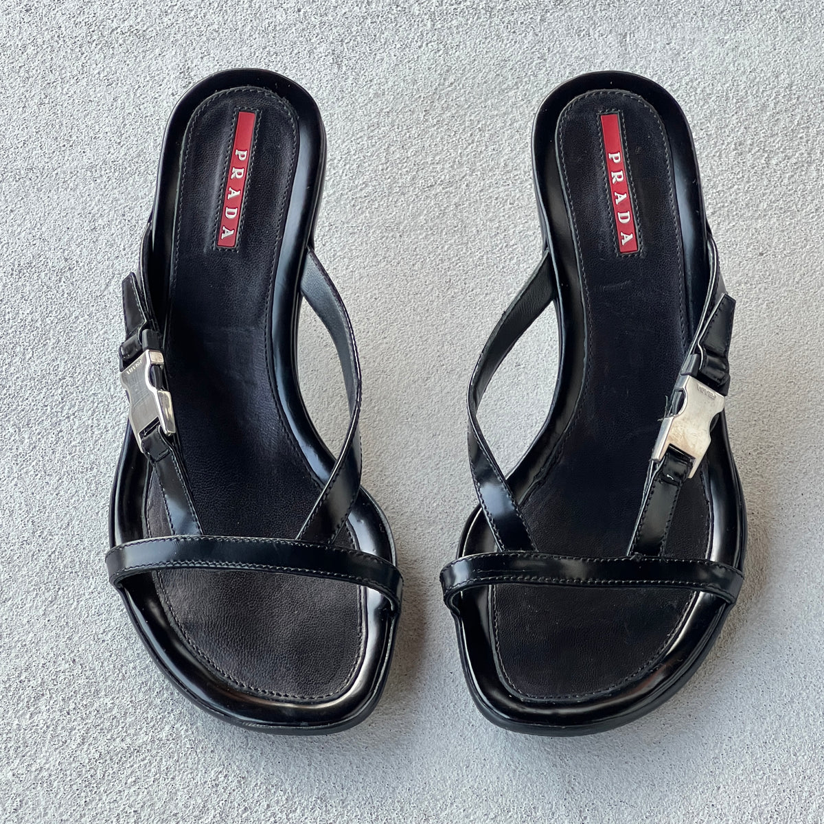 Prada | Vintage 2000s Black Leather Silver Logo Buckle Kitten Heel Mules (36.5)