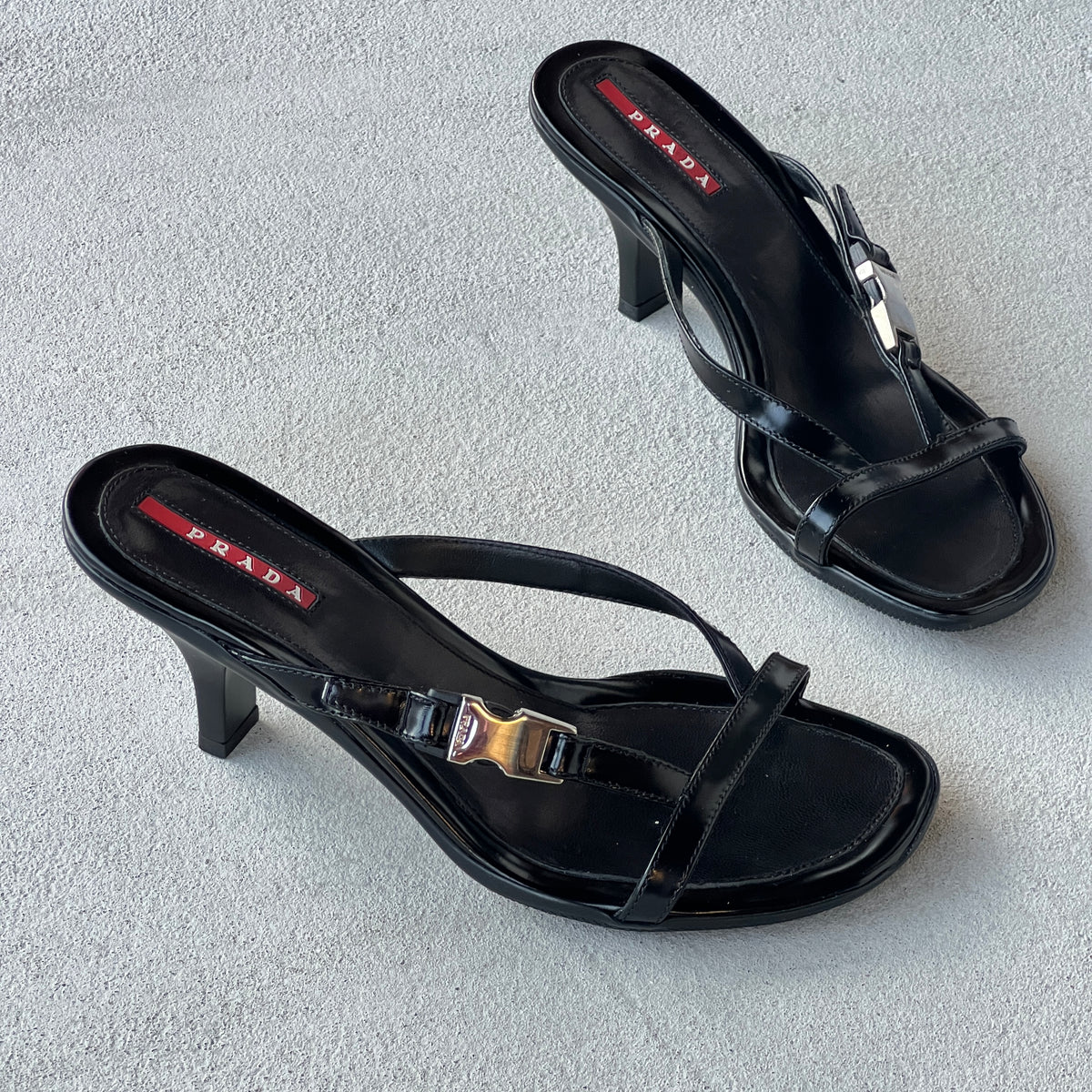 Prada | Vintage 2000s Black Leather Silver Logo Buckle Kitten Heel Mules (36.5)