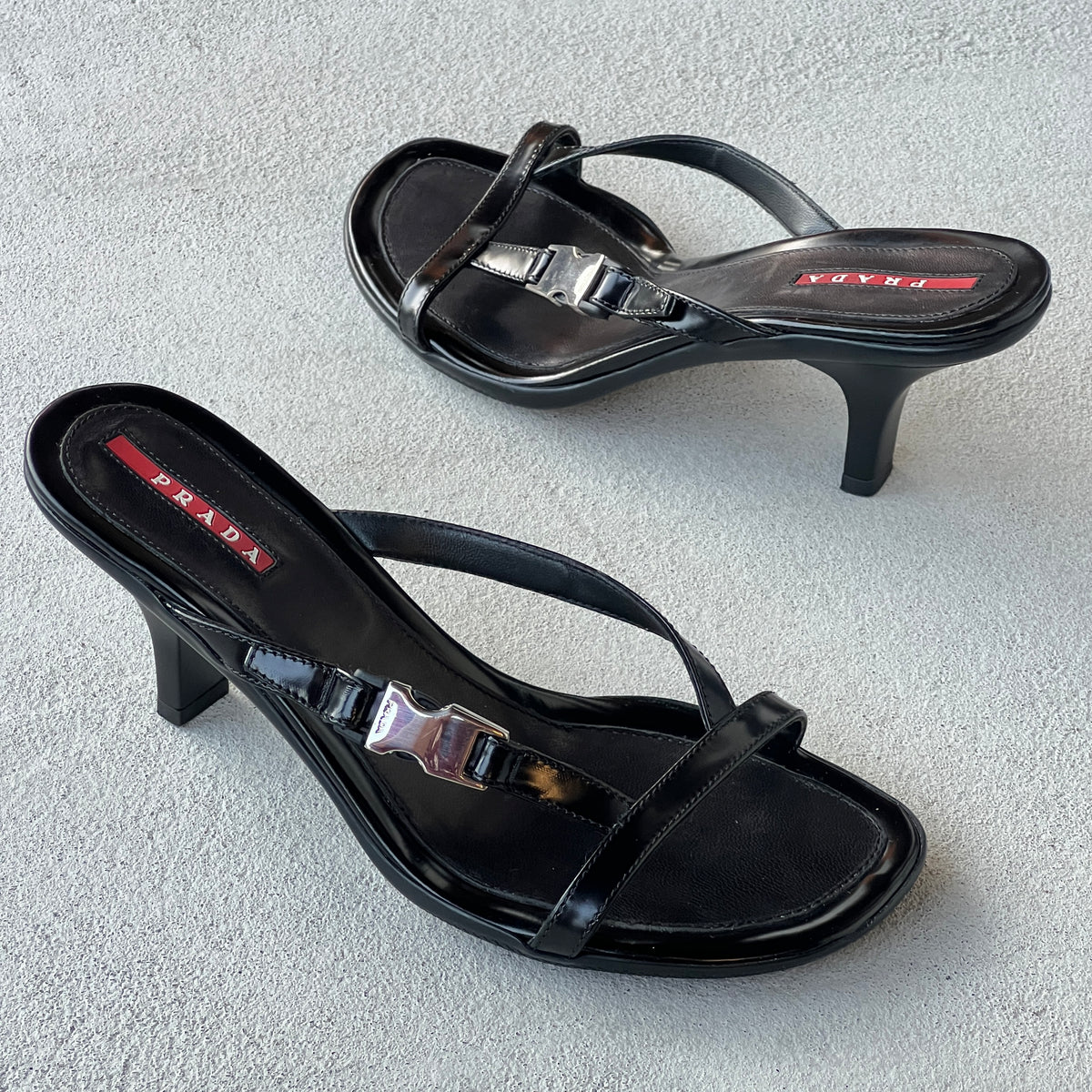 Prada | Vintage 2000s Black Leather Silver Logo Buckle Kitten Heel Mules (36.5)