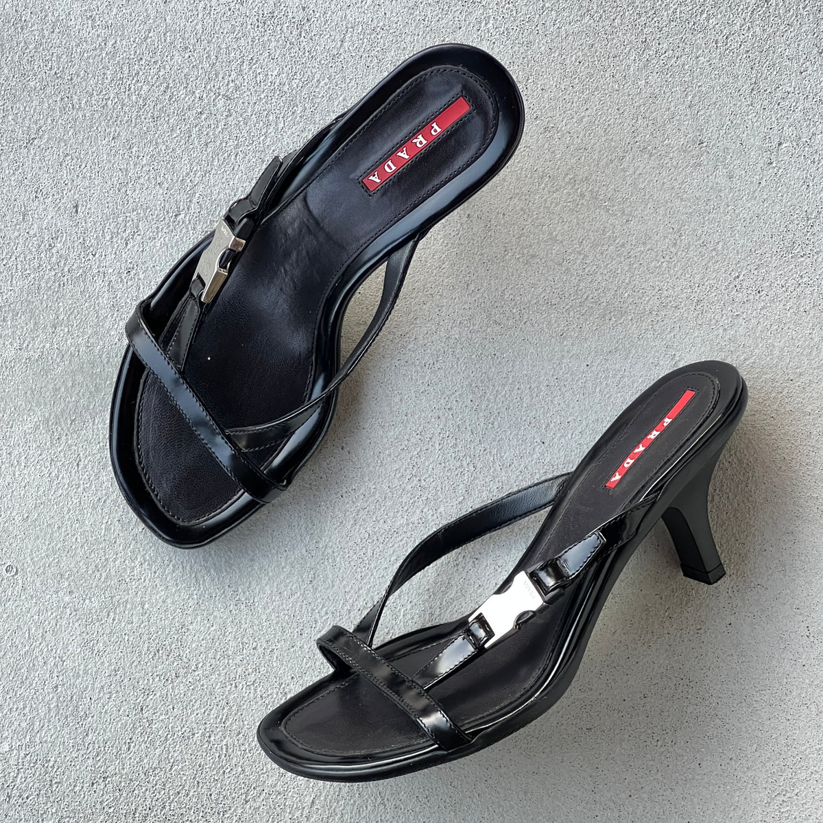 Prada | Vintage 2000s Black Leather Silver Logo Buckle Kitten Heel Mules (36.5)