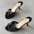 Louboutin | Black Leather Brogue Tassel Slide Mule (34)