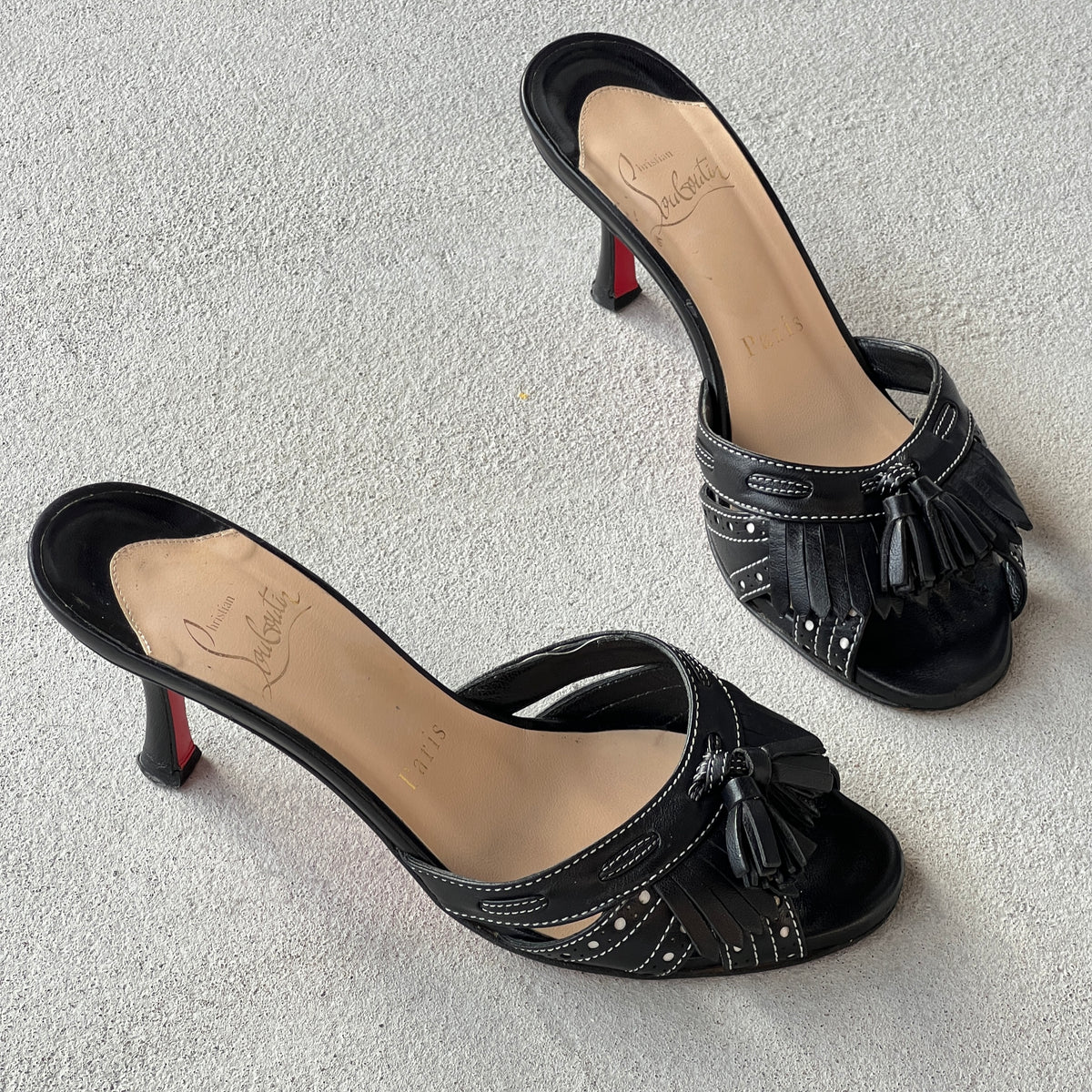 Louboutin | Black Leather Brogue Tassel Slide Mule (34)