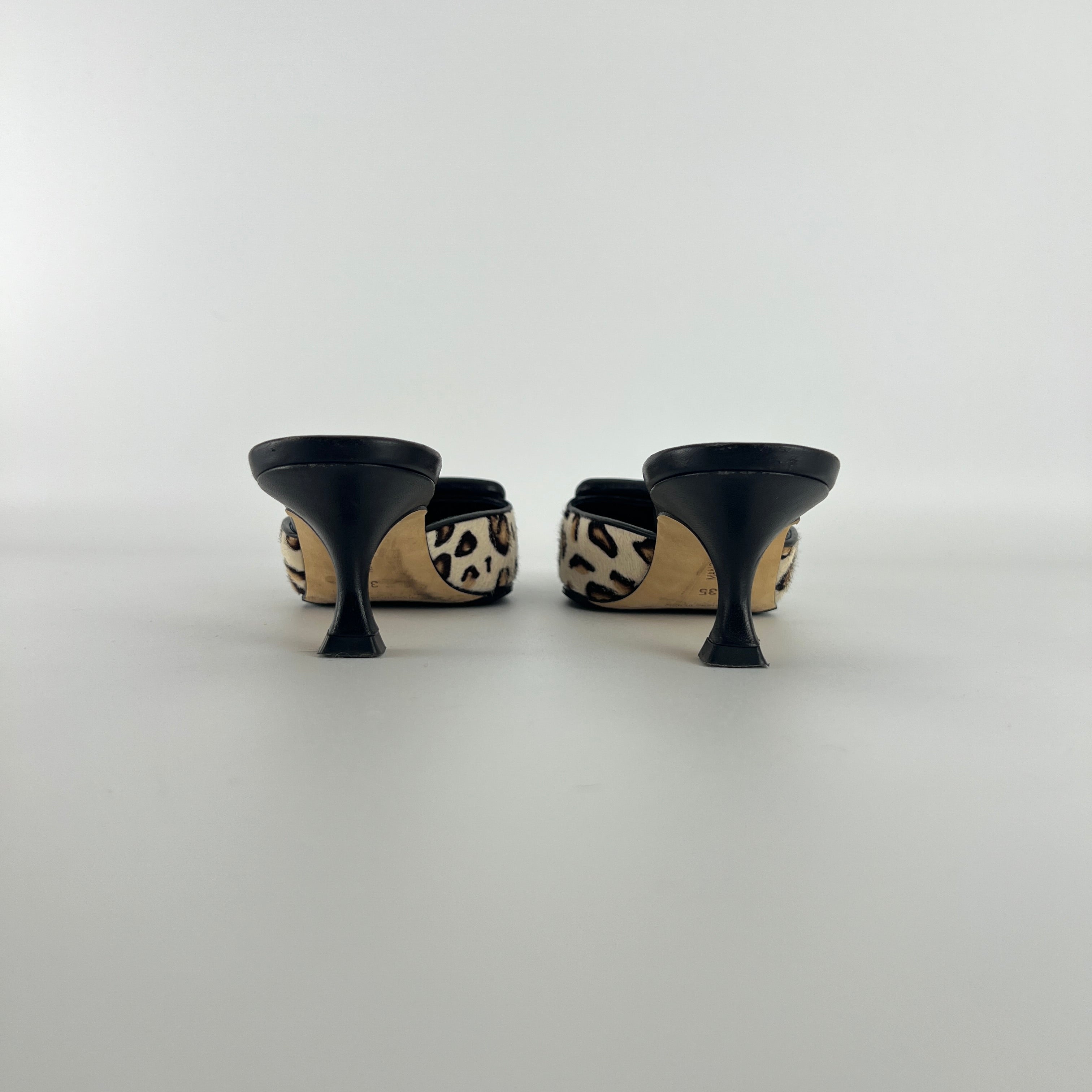 Manolo Blahnik | Calf Hair Leopard Print Black Buckle Maysale Pointed Toe Mules (35)