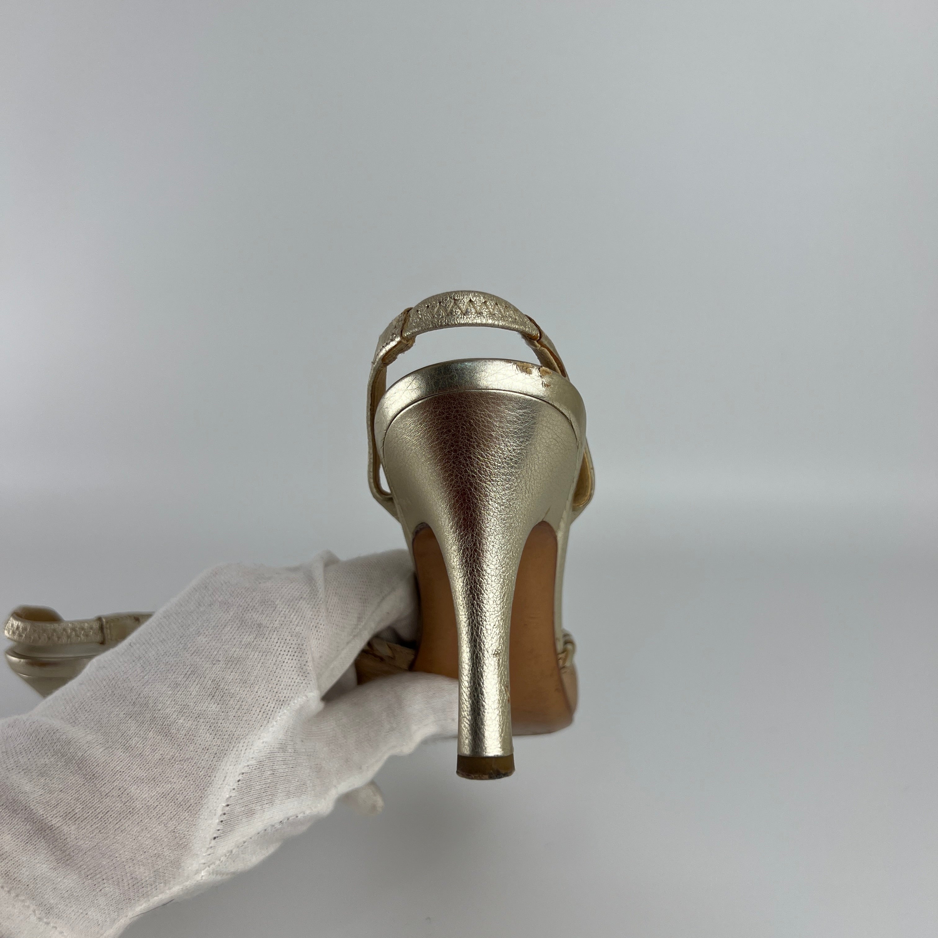 Ferragamo | Metallic Gold Leather Circle Top Stitch Slingback Heels (6C, UE 36)