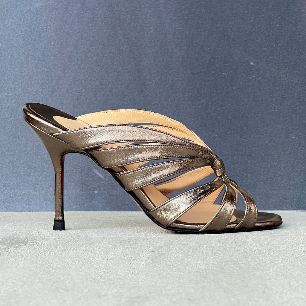Louboutin | Mulegrace Rose Gold Metallic Leather Twist Strappy Sandal Mule Heels (36)