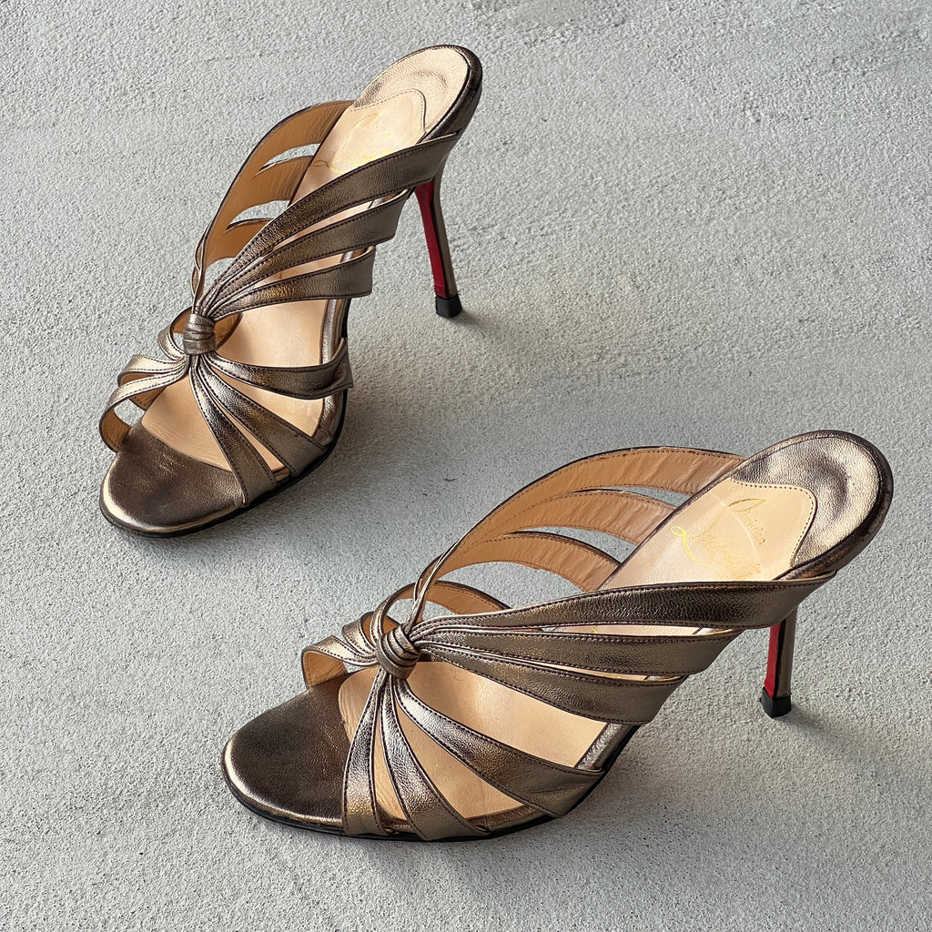 Louboutin | Mulegrace Rose Gold Metallic Leather Twist Strappy Sandal Mule Heels (36)