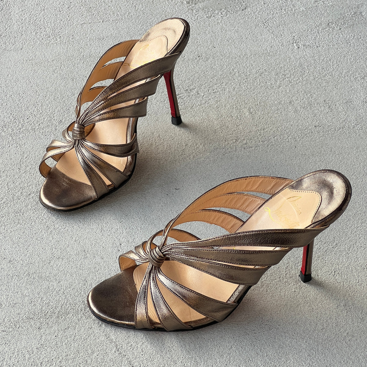 Louboutin | Mulegrace Rose Gold Metallic Leather Twist Strappy Sandal Mule Heels (36)