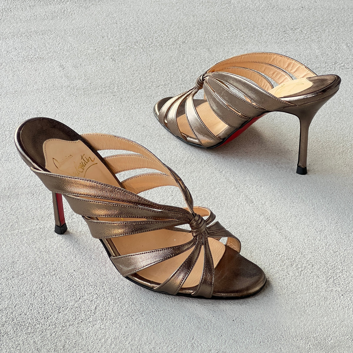 Louboutin | Mulegrace Rose Gold Metallic Leather Twist Strappy Sandal Mule Heels (36)