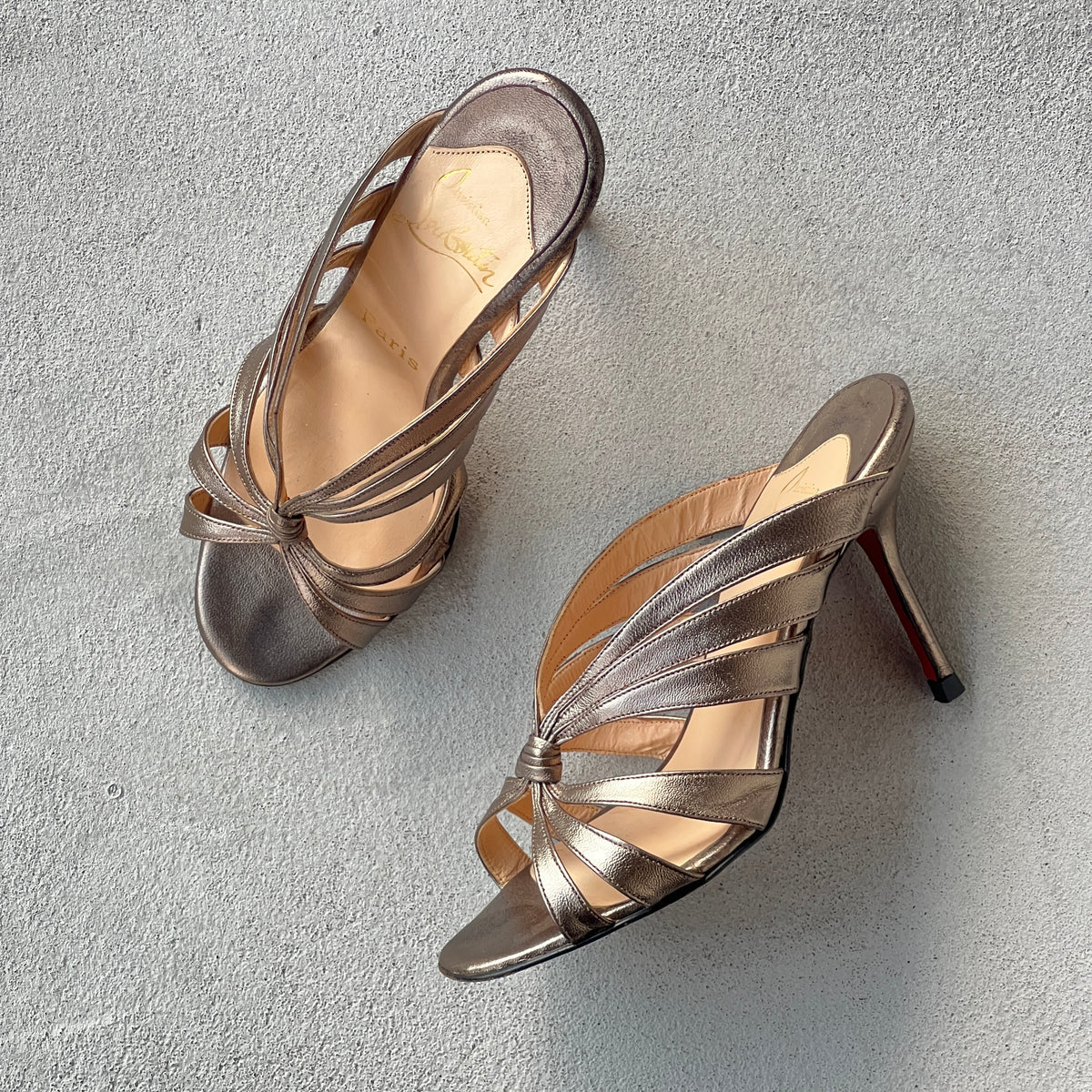 Louboutin | Mulegrace Rose Gold Metallic Leather Twist Strappy Sandal Mule Heels (36)