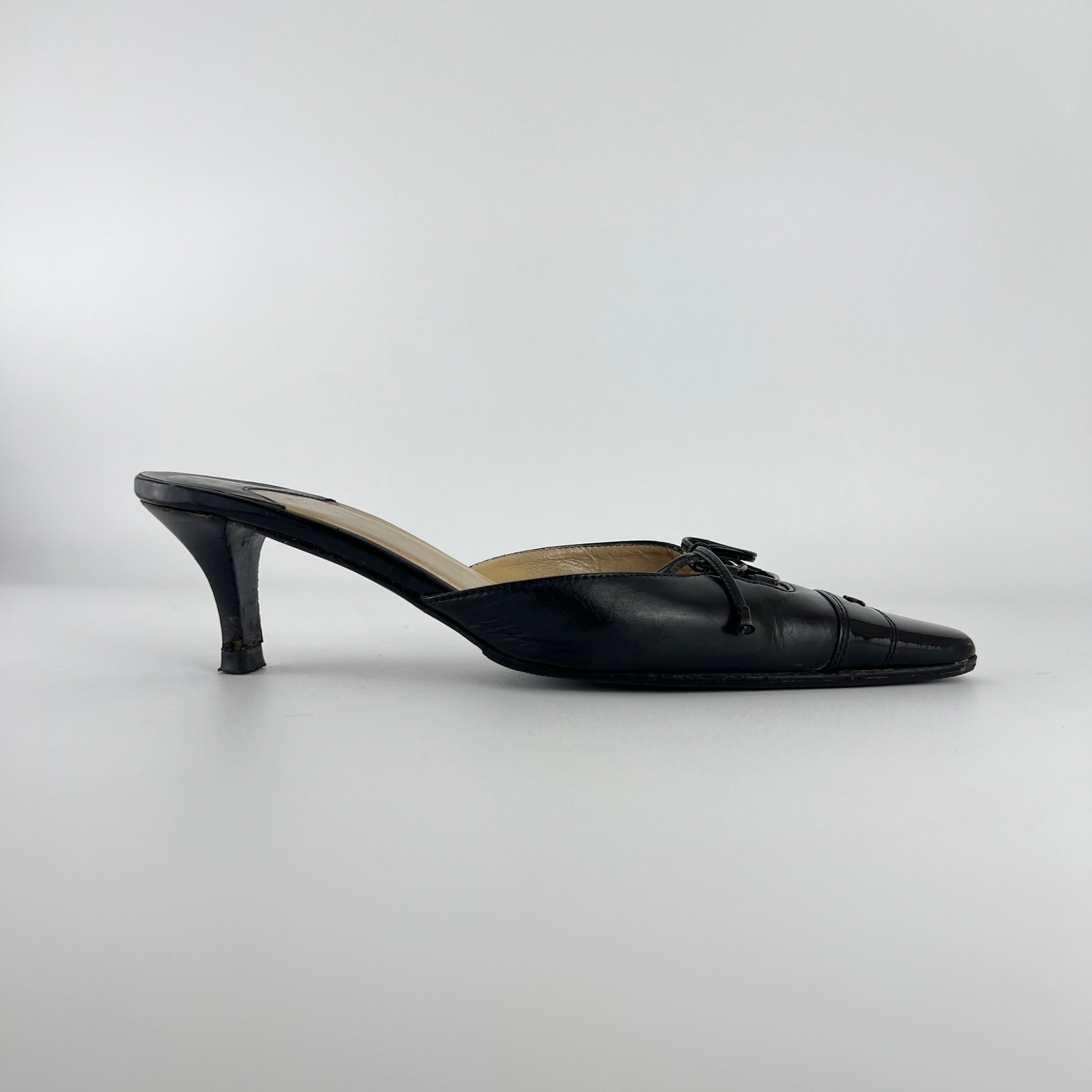 Chanel | Vintage Black Leather CC Logo Ribbon Bow Pointed Toe Kitten Mules (36)
