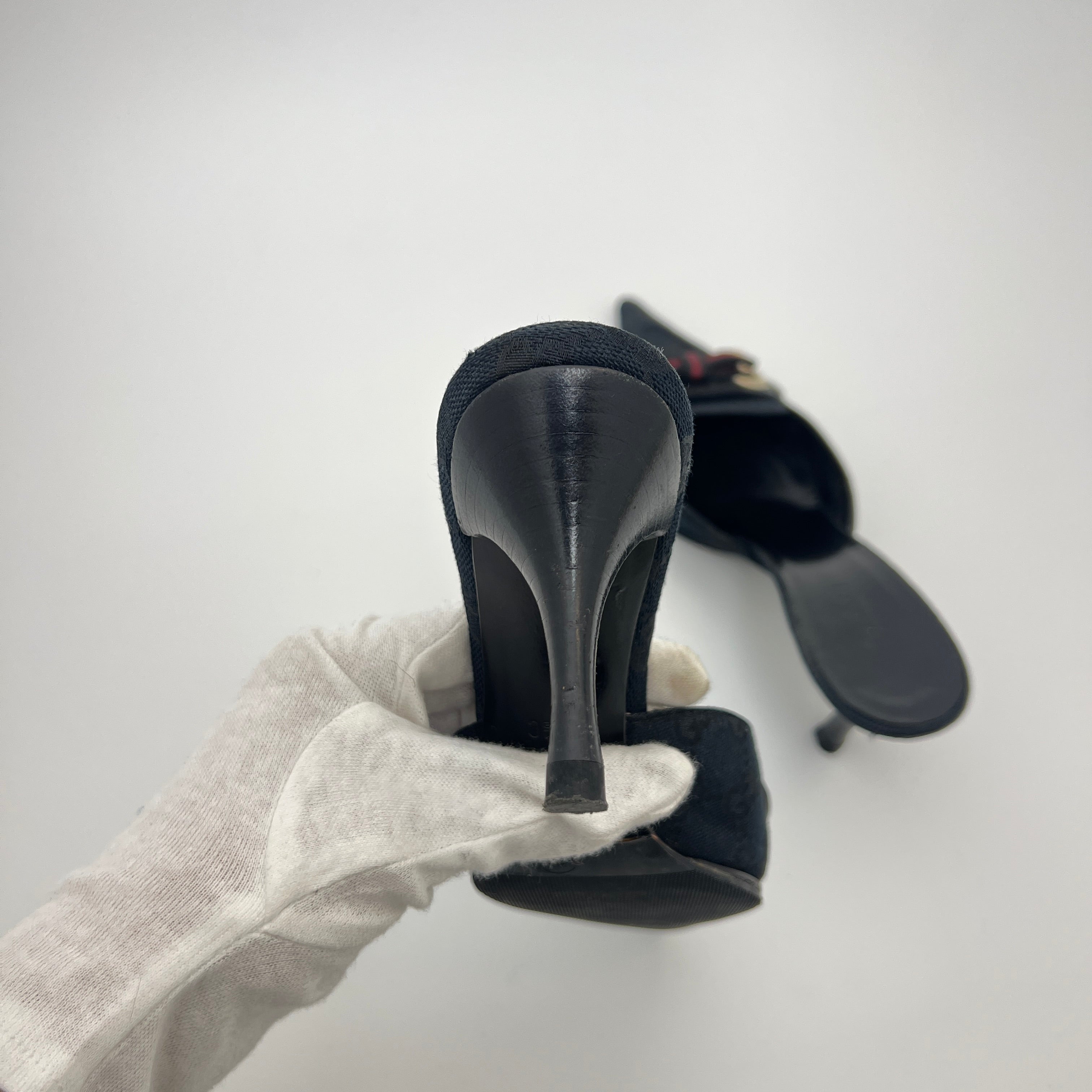 Gucci | Black Leather Canvas Pointed Toe Ribbon Gold Hardware Mules (35.5)