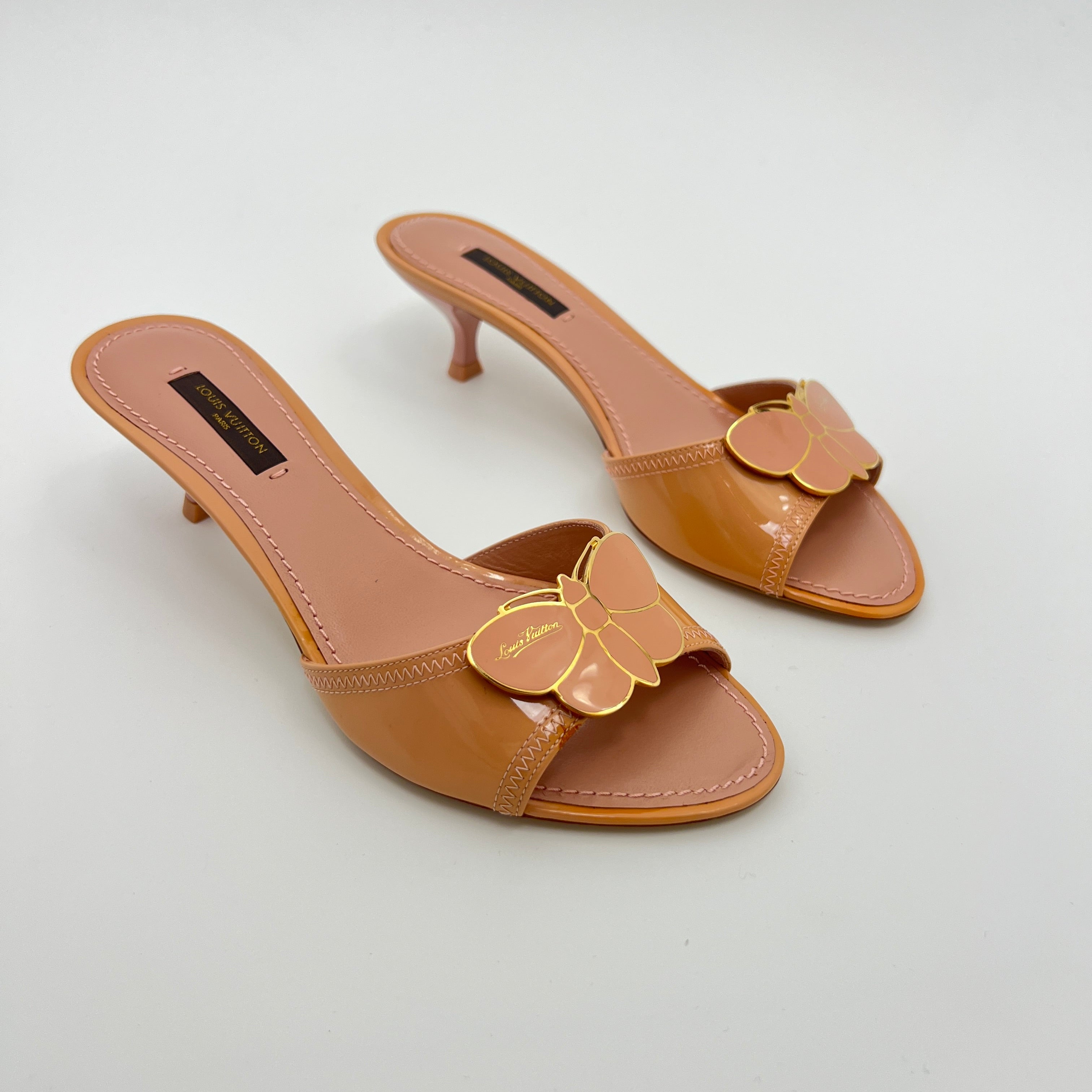 Louis Vuitton | Nude Pink Butterfly Logo Patent Leather Mules Unworn (35.5)