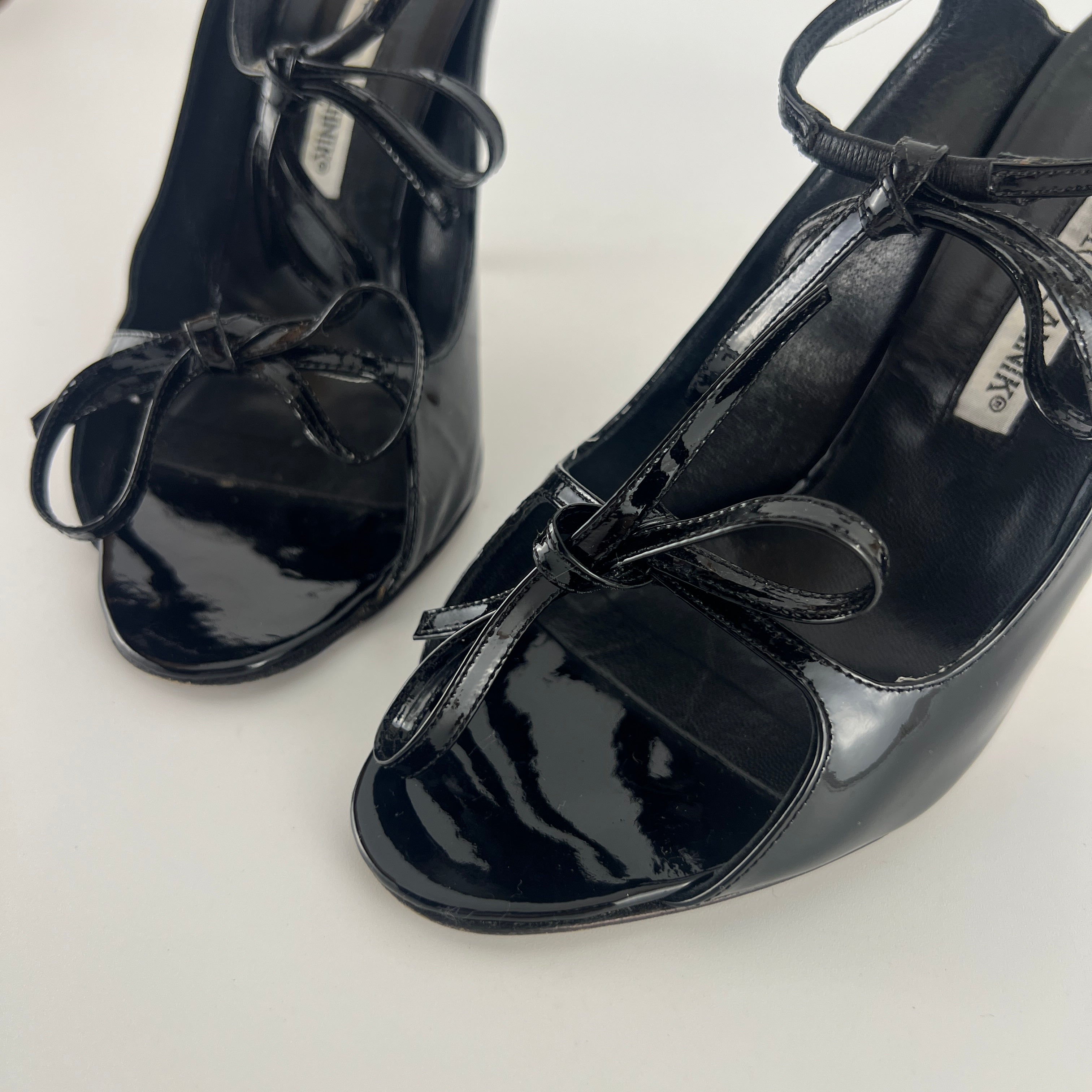 Manolo Blahnik | Claudia Black Patent Leather Ribbon Bow Sandal Heels (37.5)