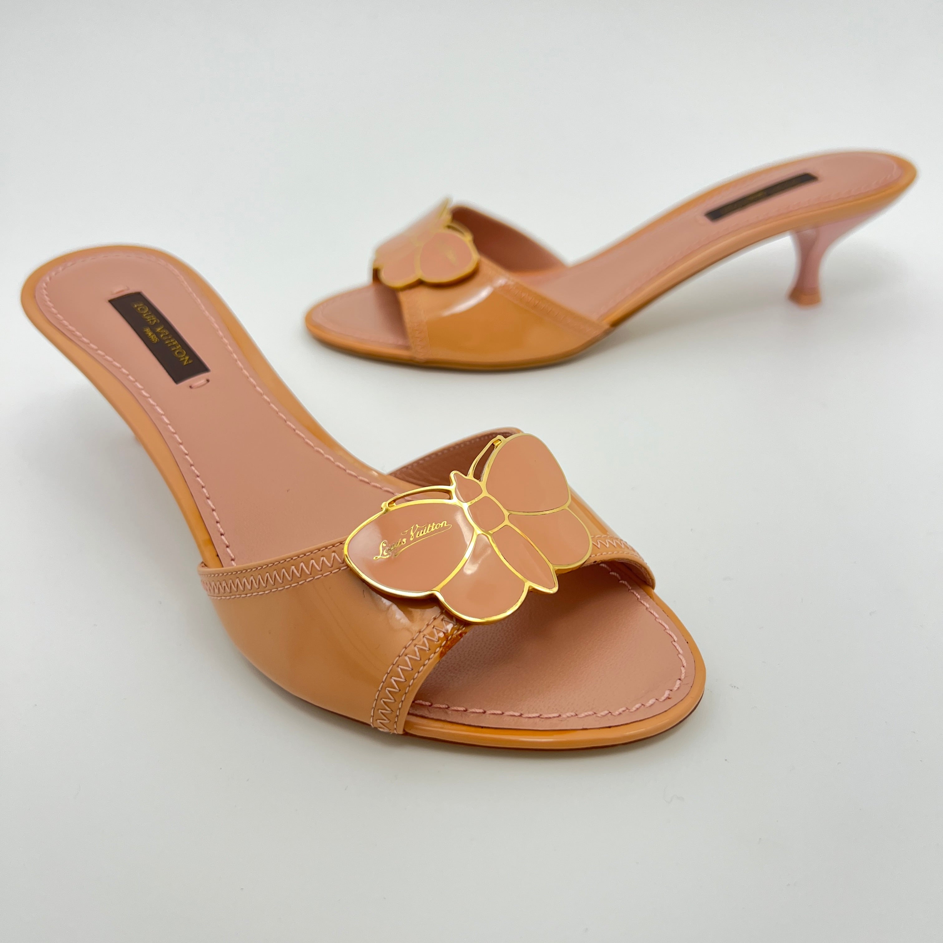 Louis Vuitton | Nude Pink Butterfly Logo Patent Leather Mules Unworn (35.5)