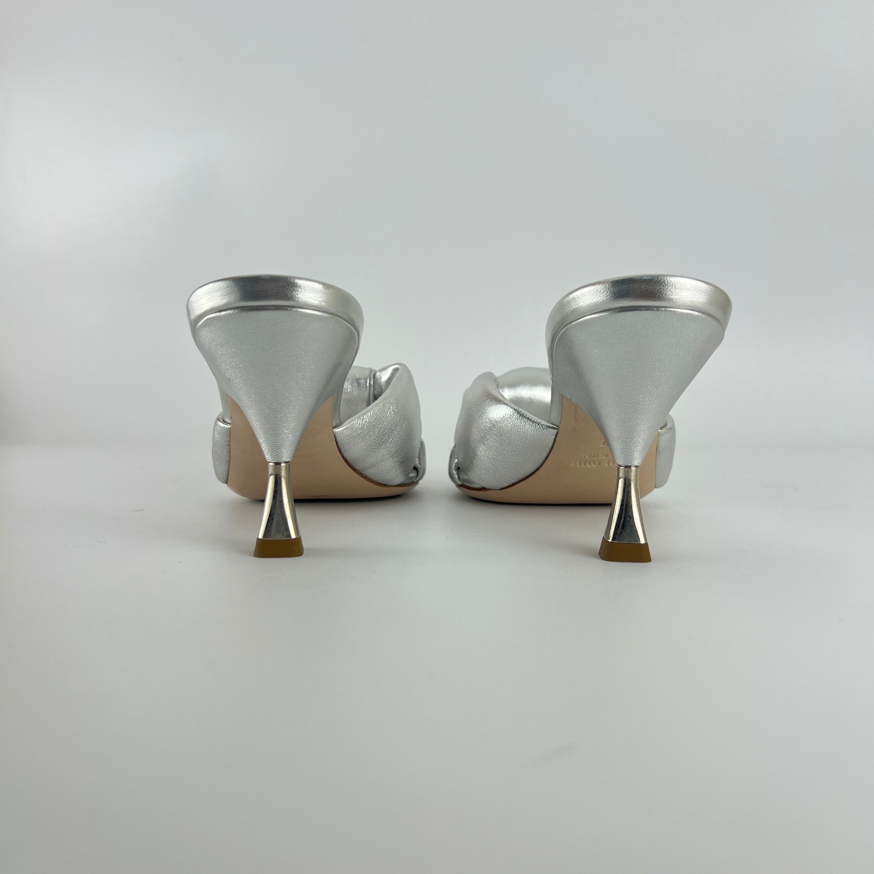 Miu Miu | Metallic Silver Leather Knot Metal Heel Slide Mules (37)