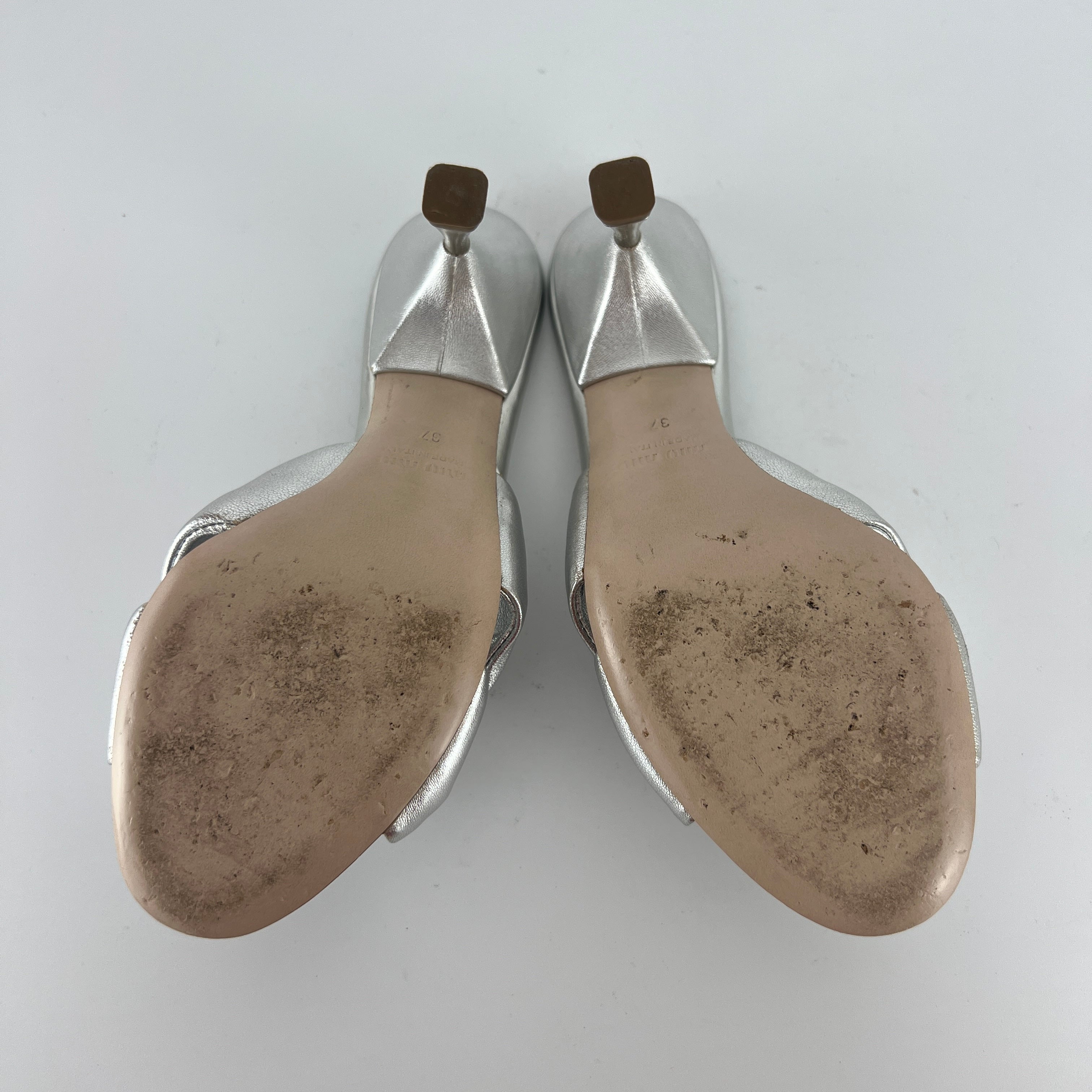 Miu Miu | Metallic Silver Leather Knot Metal Heel Slide Mules (37)