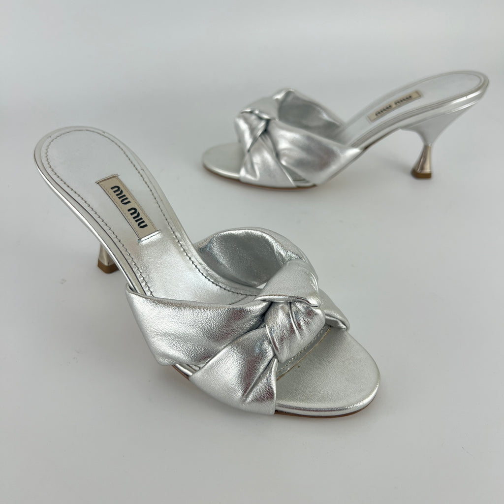 Miu Miu | Metallic Silver Leather Knot Metal Heel Slide Mules (37)