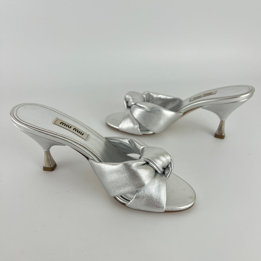Miu Miu | Metallic Silver Leather Knot Metal Heel Slide Mules (37)