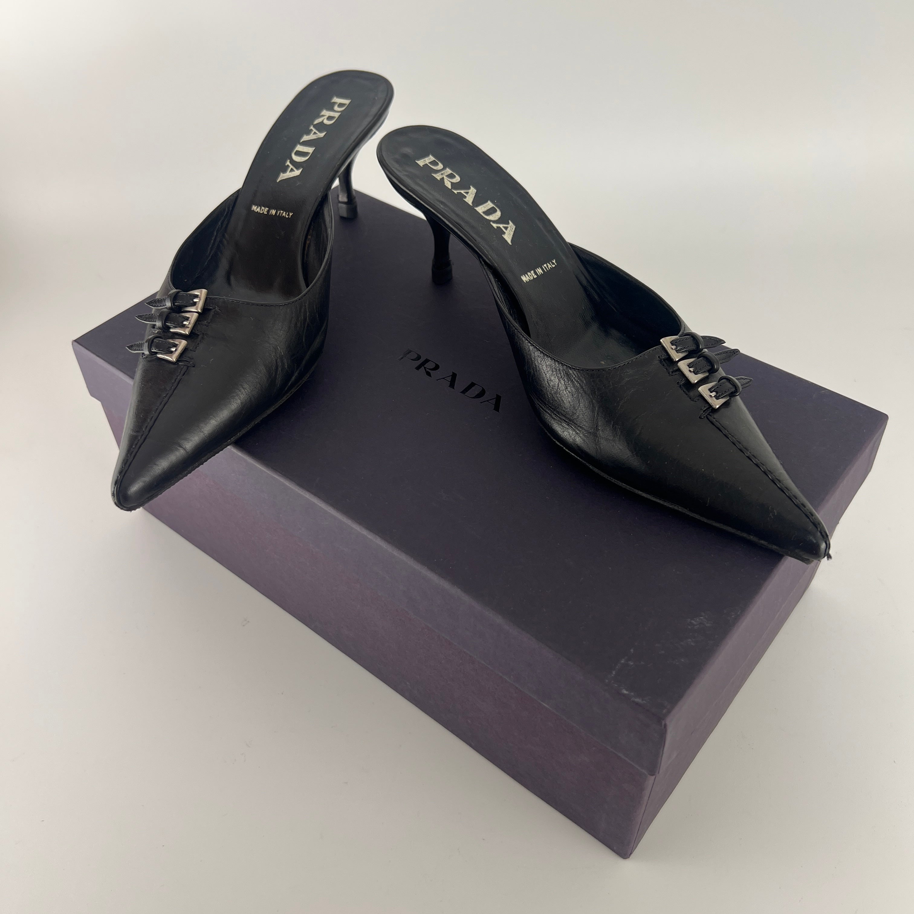 Prada | Vintage Black Leather Silver Buckle Pointed Toe Kitten Heel Mule (35.5)